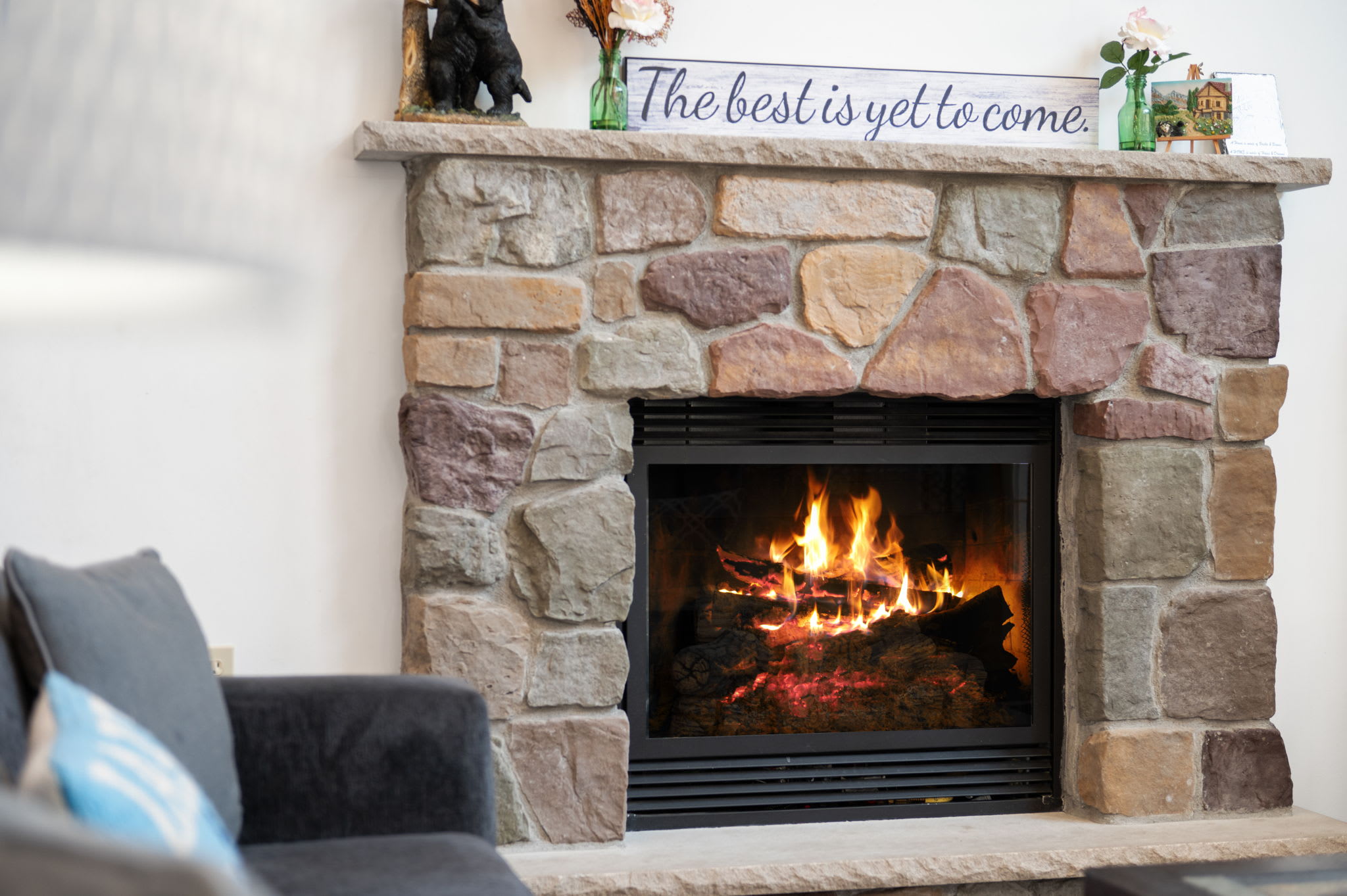 Warm your toes by the crackling fire in the handsome stone fireplace