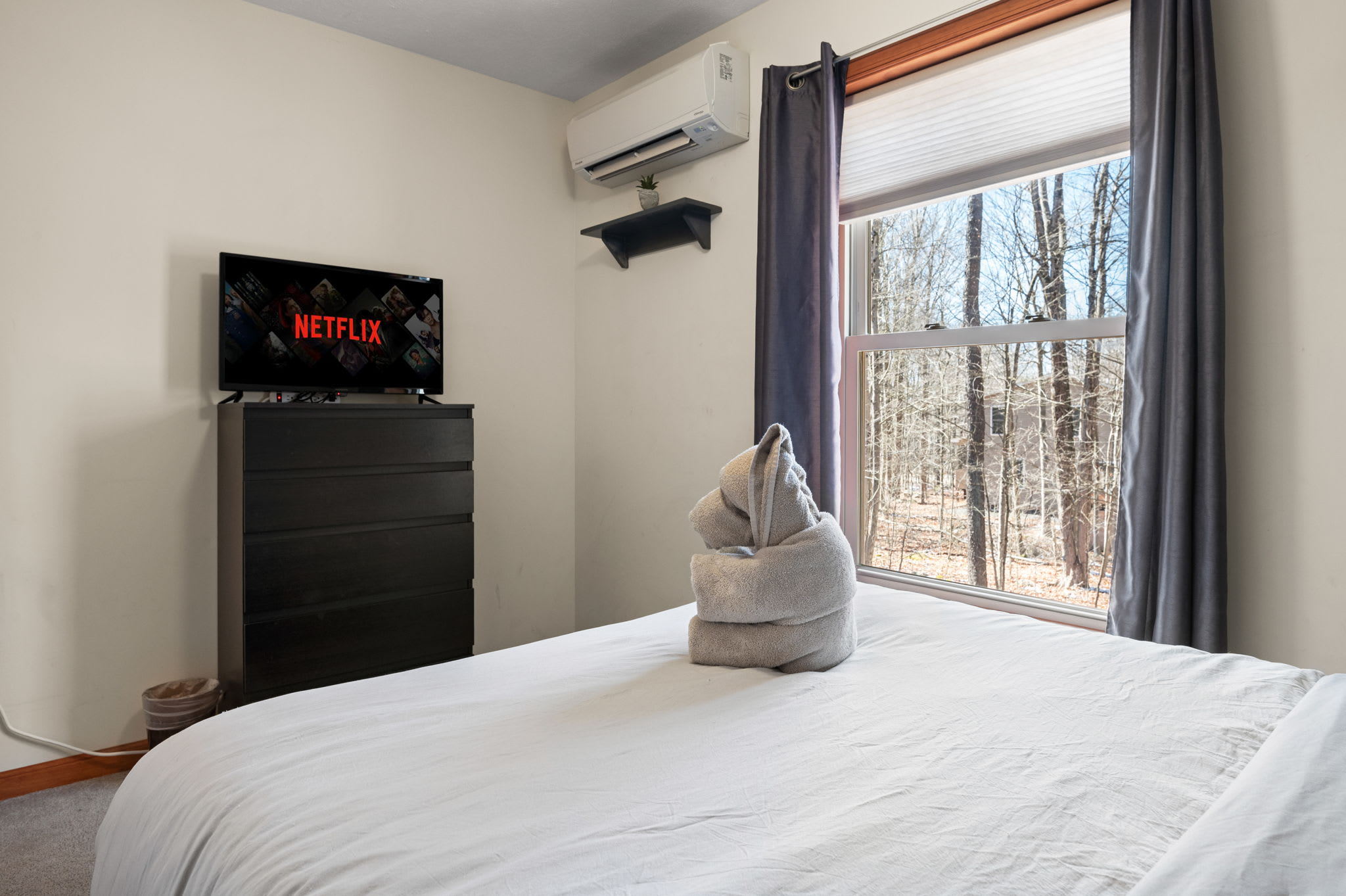 Wake up refreshed in this peaceful queen bedroom with soft morning light