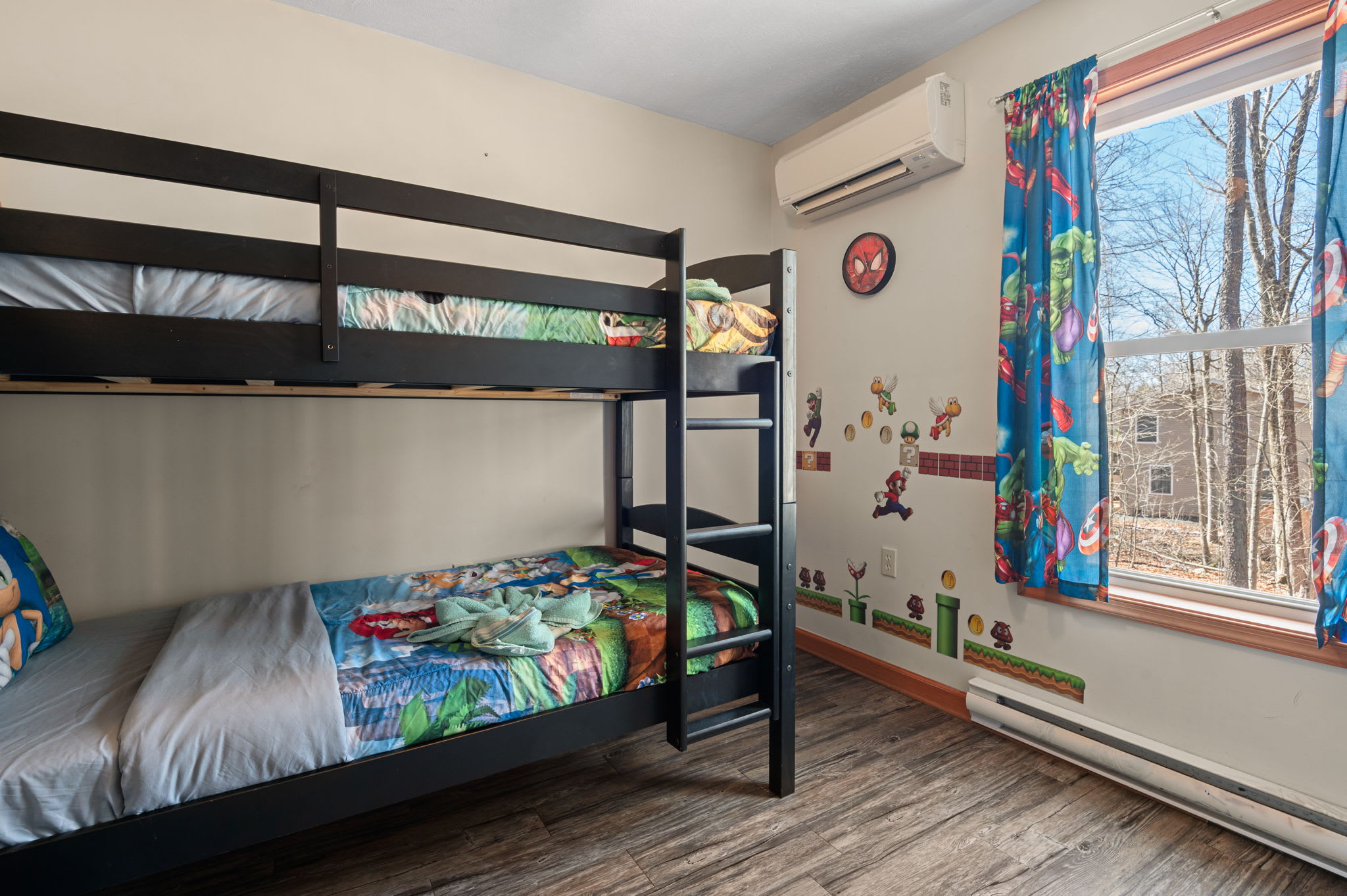 Kids will love the cozy bunk beds with scenic woodland views and plenty of natural light