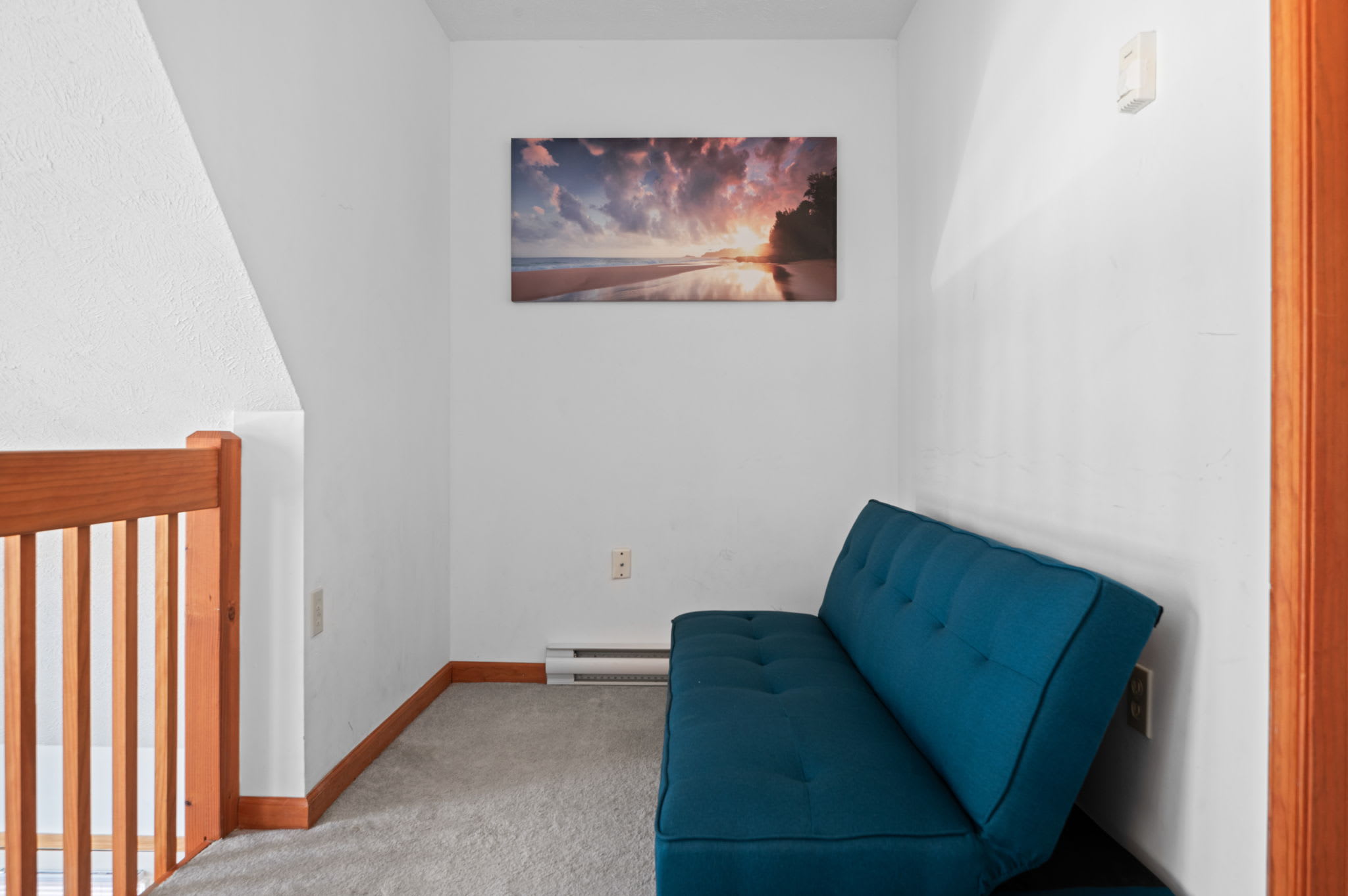 Look out over the living area from the bright and airy loft space
