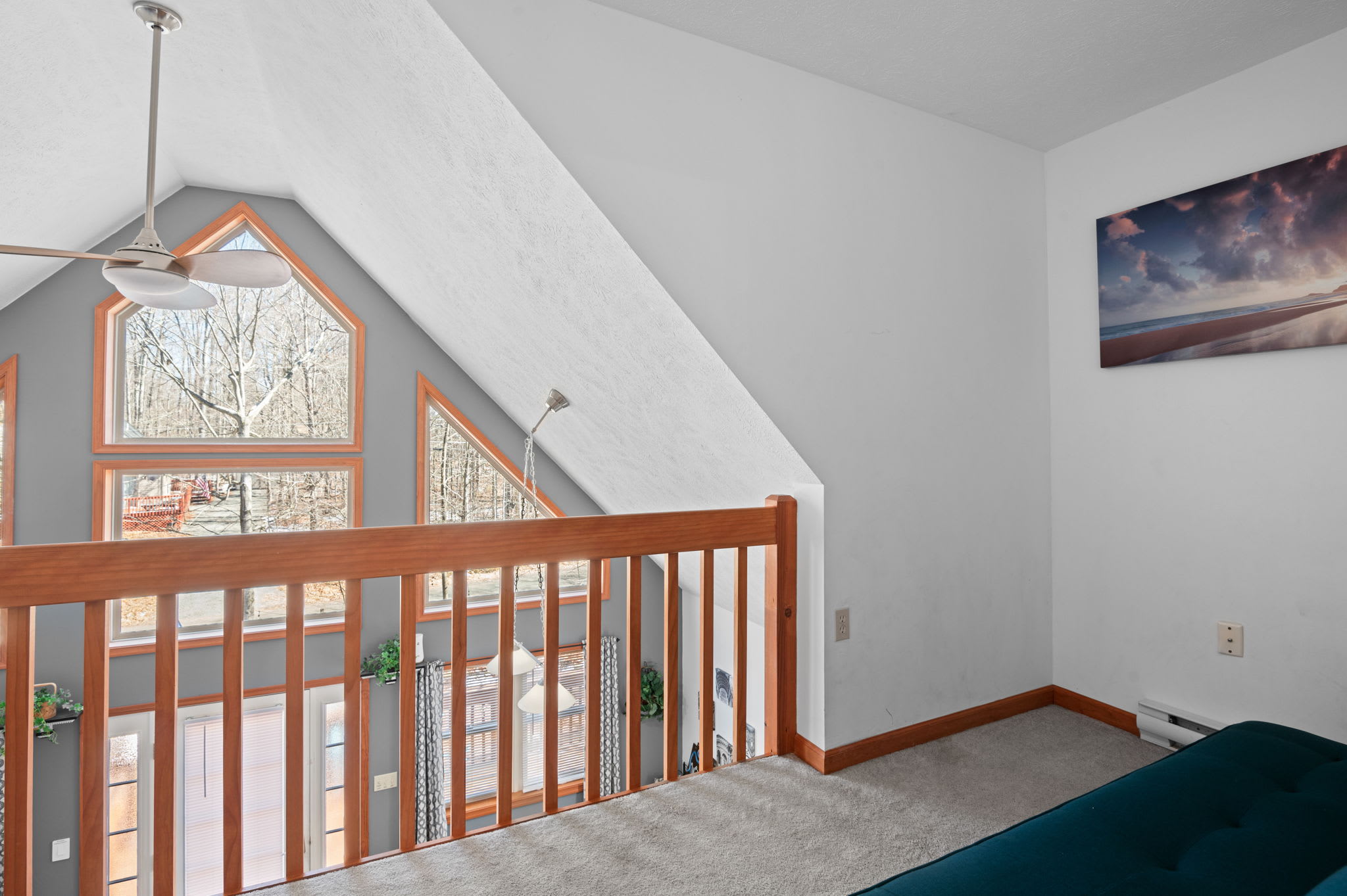 The open loft adds character to this unique A-frame chalet retreat