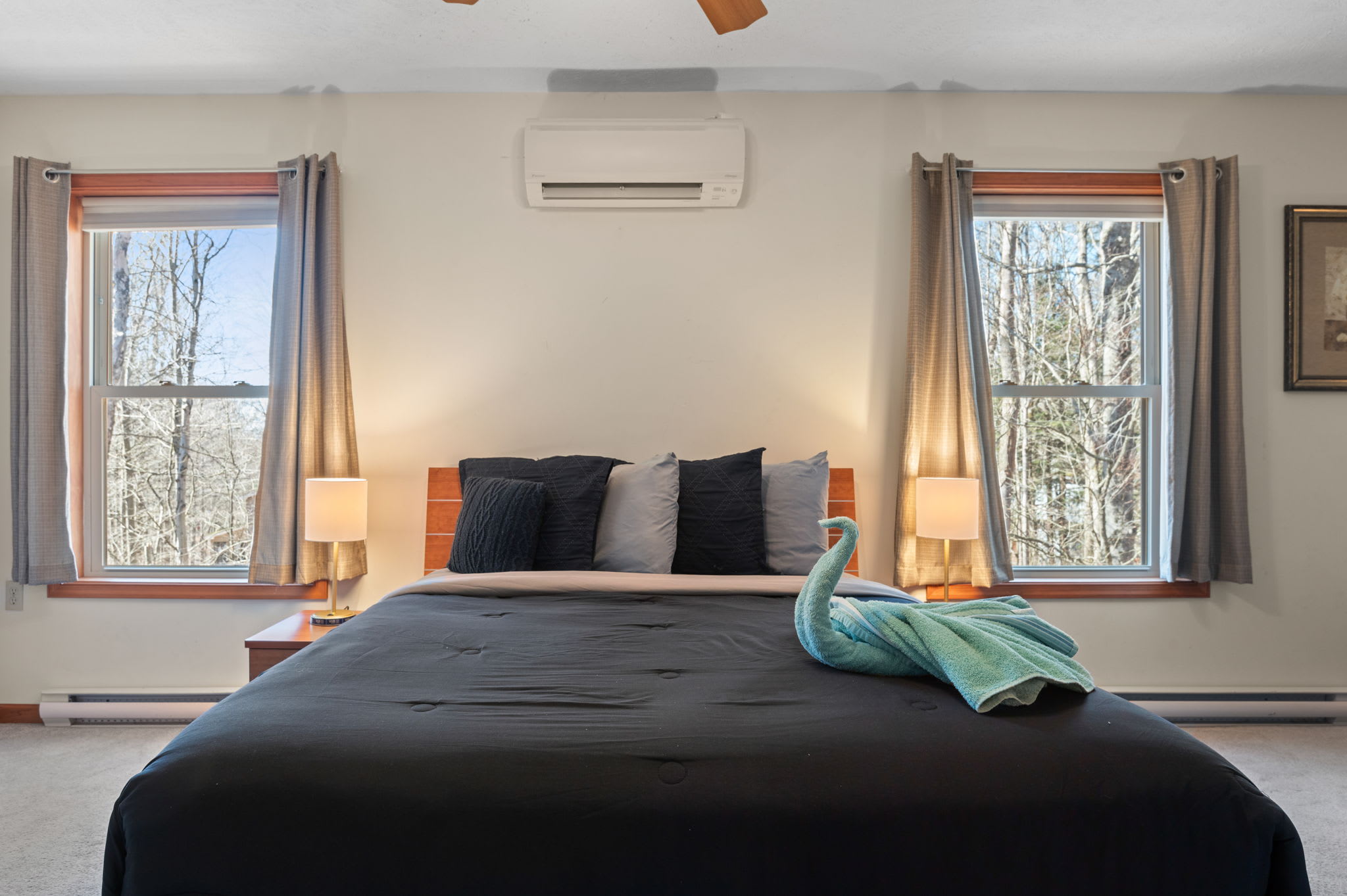 Start each day with stunning woodland views from the main bedroom's panoramic windows