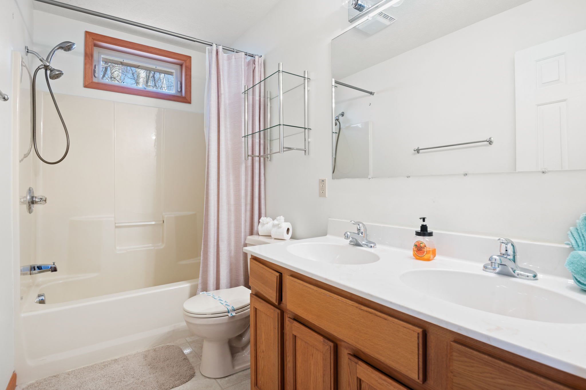Pamper yourself in the spacious full bathroom with double vanity and bathtub
