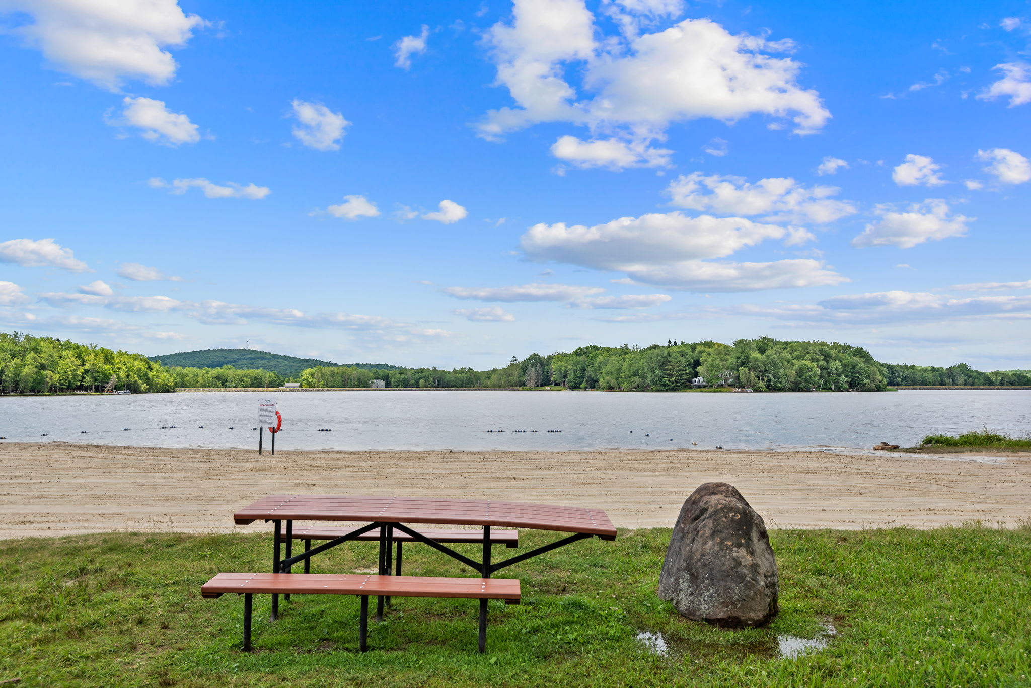 Relax at the scenic lakeside picnic area with panoramic water views