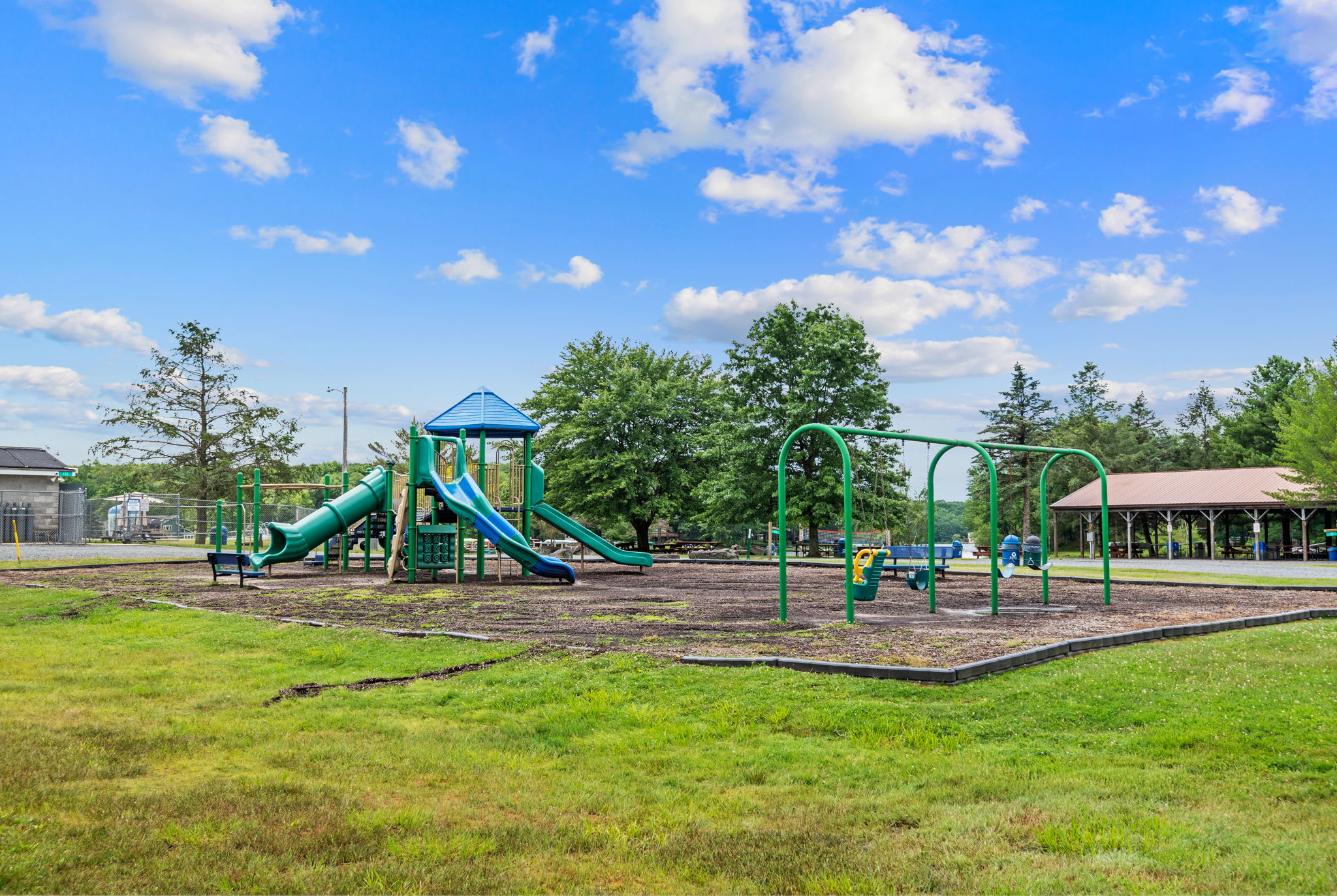 Kids will love the community playground with swings and play structures