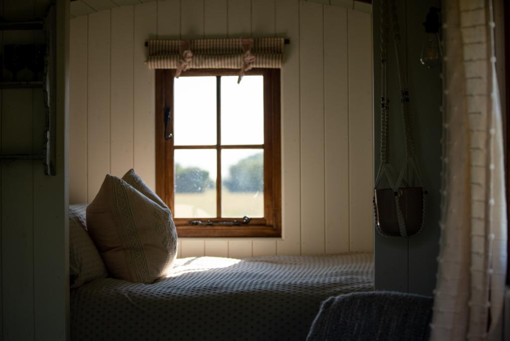 Unwind in the comfort of soft bedding and wake up to the peaceful Sussex landscape.