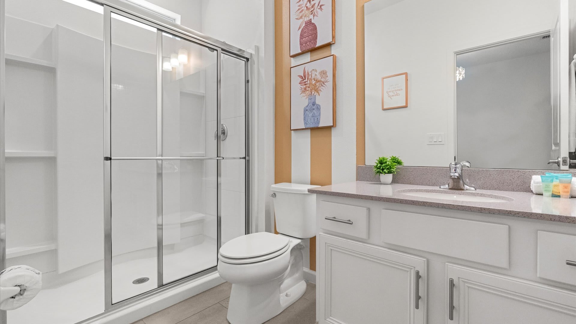 Full modern bathroom with combined bathtub and shower