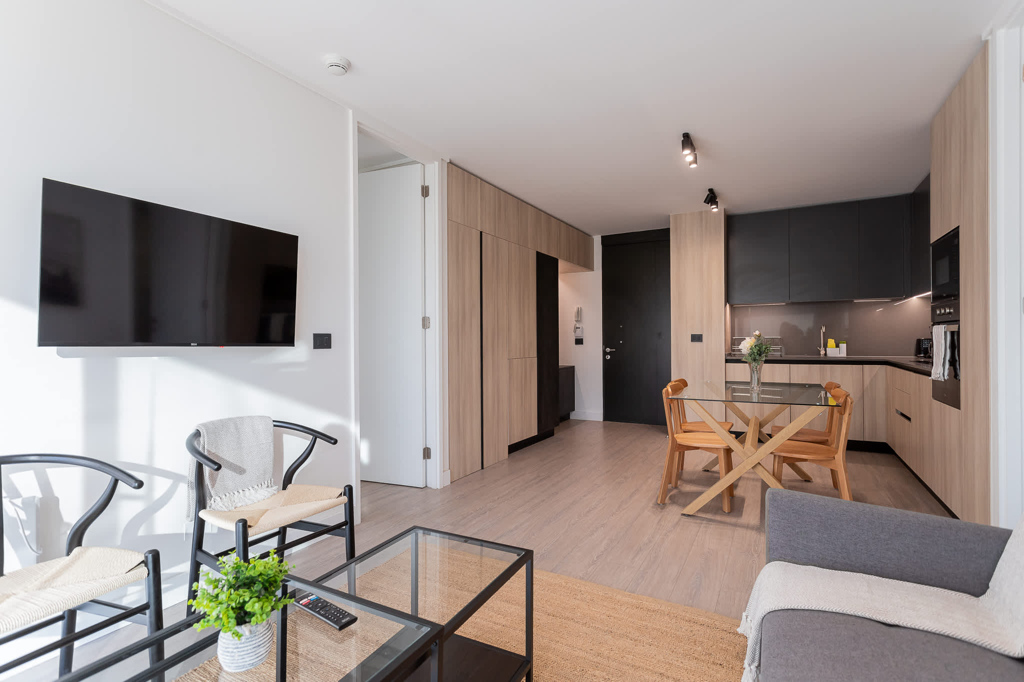 Experience modern living in this stylish space, featuring an open layout, sleek furniture, and a cozy atmosphere perfect for relaxation.
