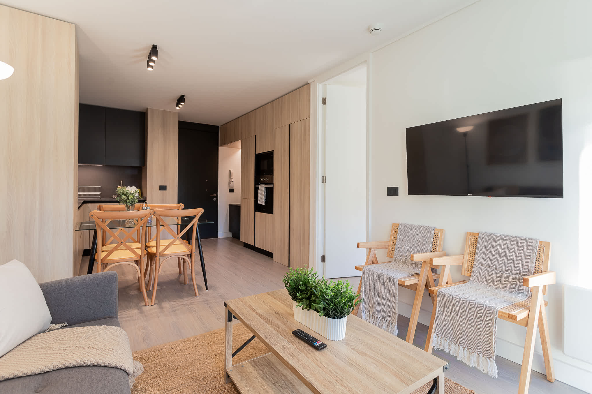 Experience modern comfort in this stylish living space, featuring sleek design and cozy furnishings for a relaxing getaway.