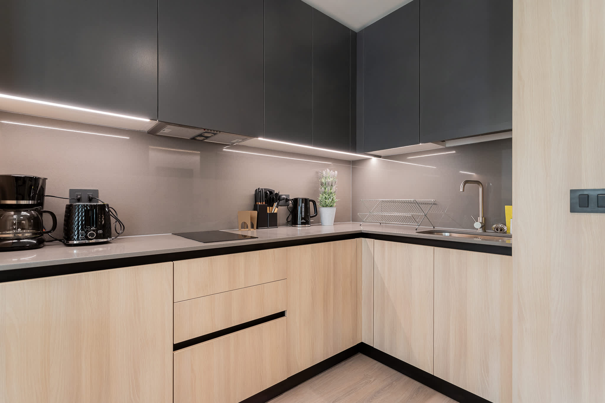 Experience a sleek, modern kitchen equipped with stylish appliances and ample space for your culinary adventures.