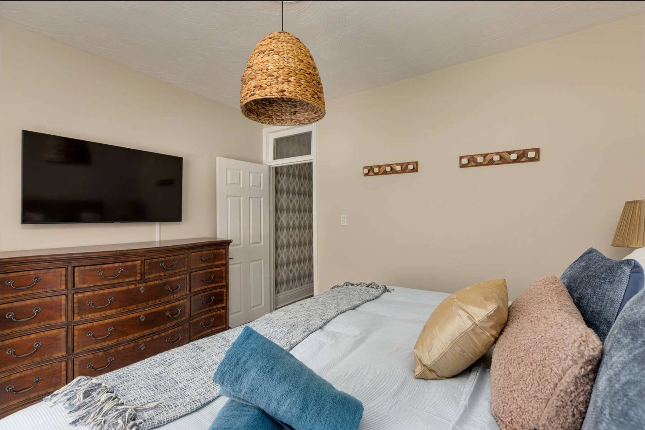 King bedroom with smart TV