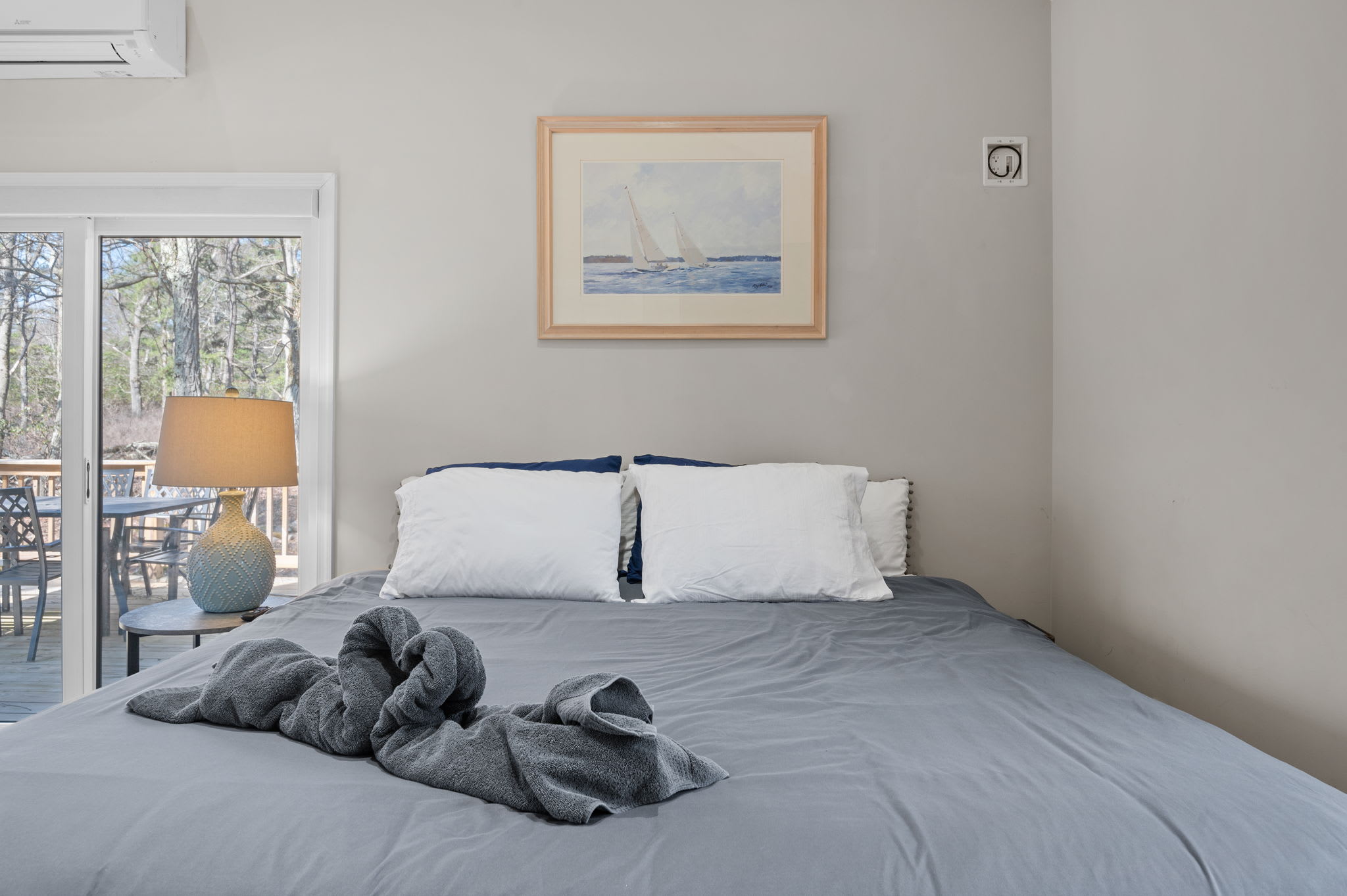 Morning Light and Comfort
Wake up to nature views and gentle morning sun in this light-filled room with private deck access.