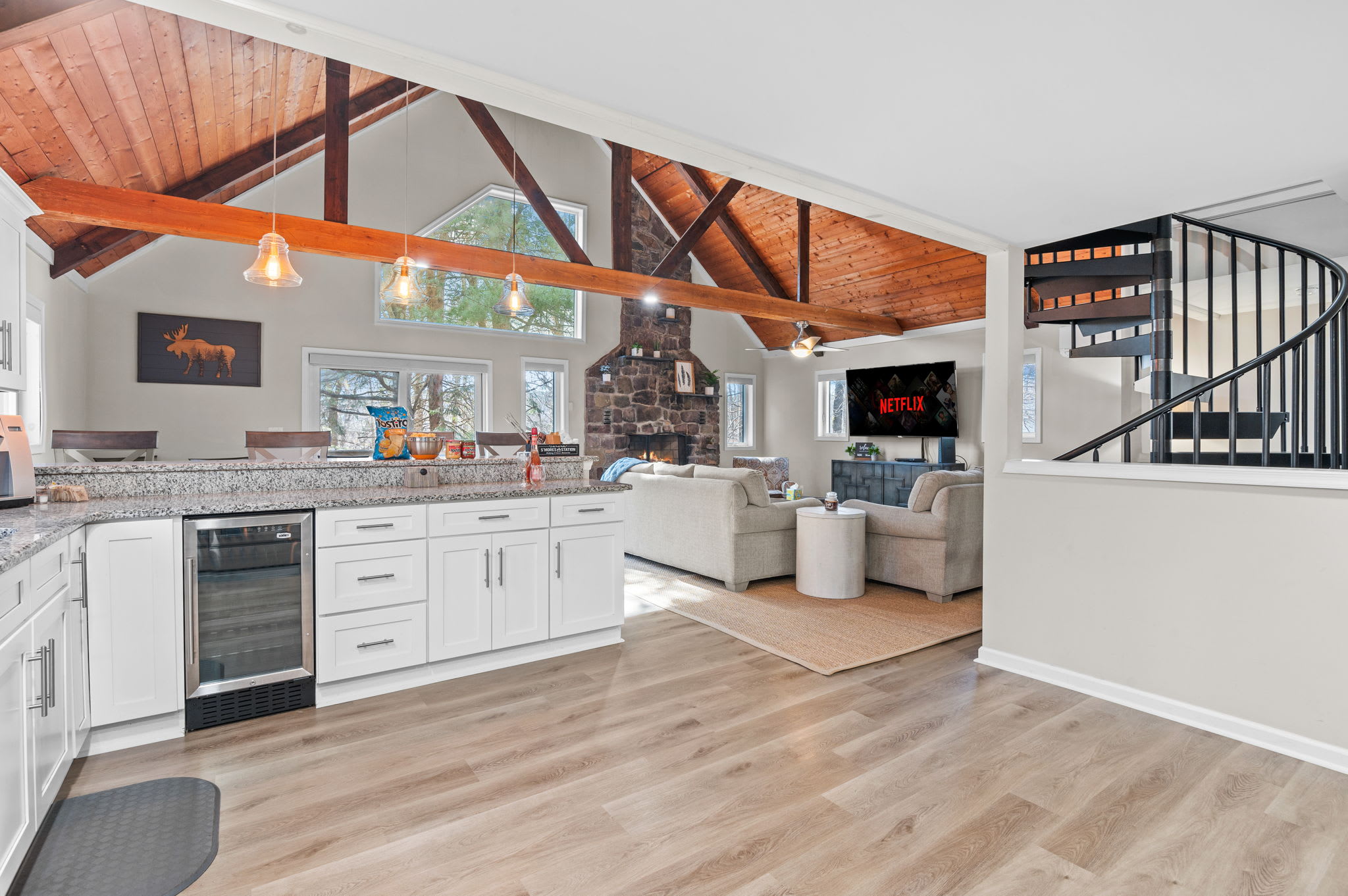 Chef’s Dream Kitchen
Cook, chat, and gather in this wide-open kitchen featuring stainless steel appliances and a view into the heart of the home.