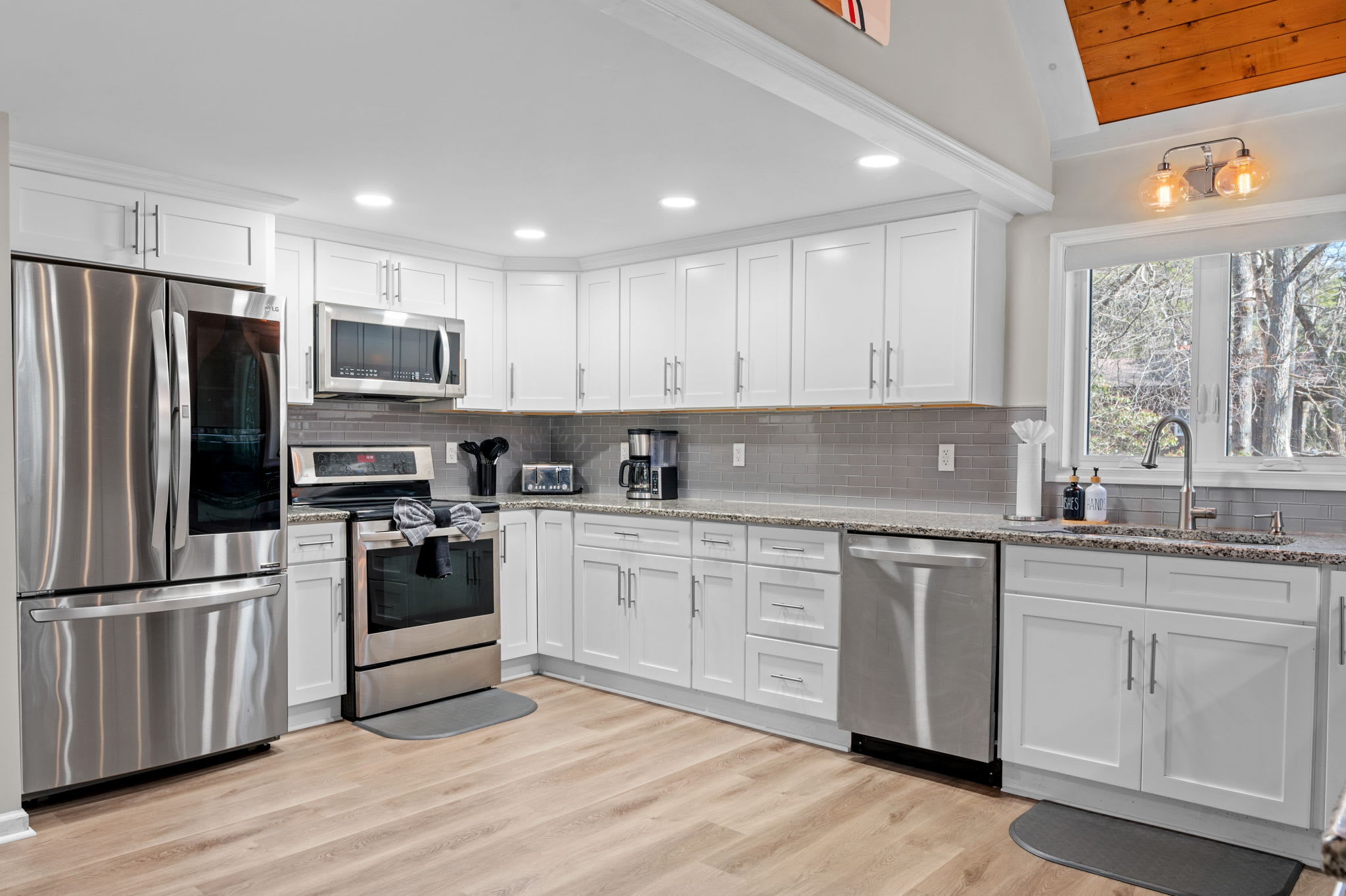 Sleek and Fully Stocked
Modern appliances, spacious counters, and a clean layout make cooking a breeze in this bright kitchen.