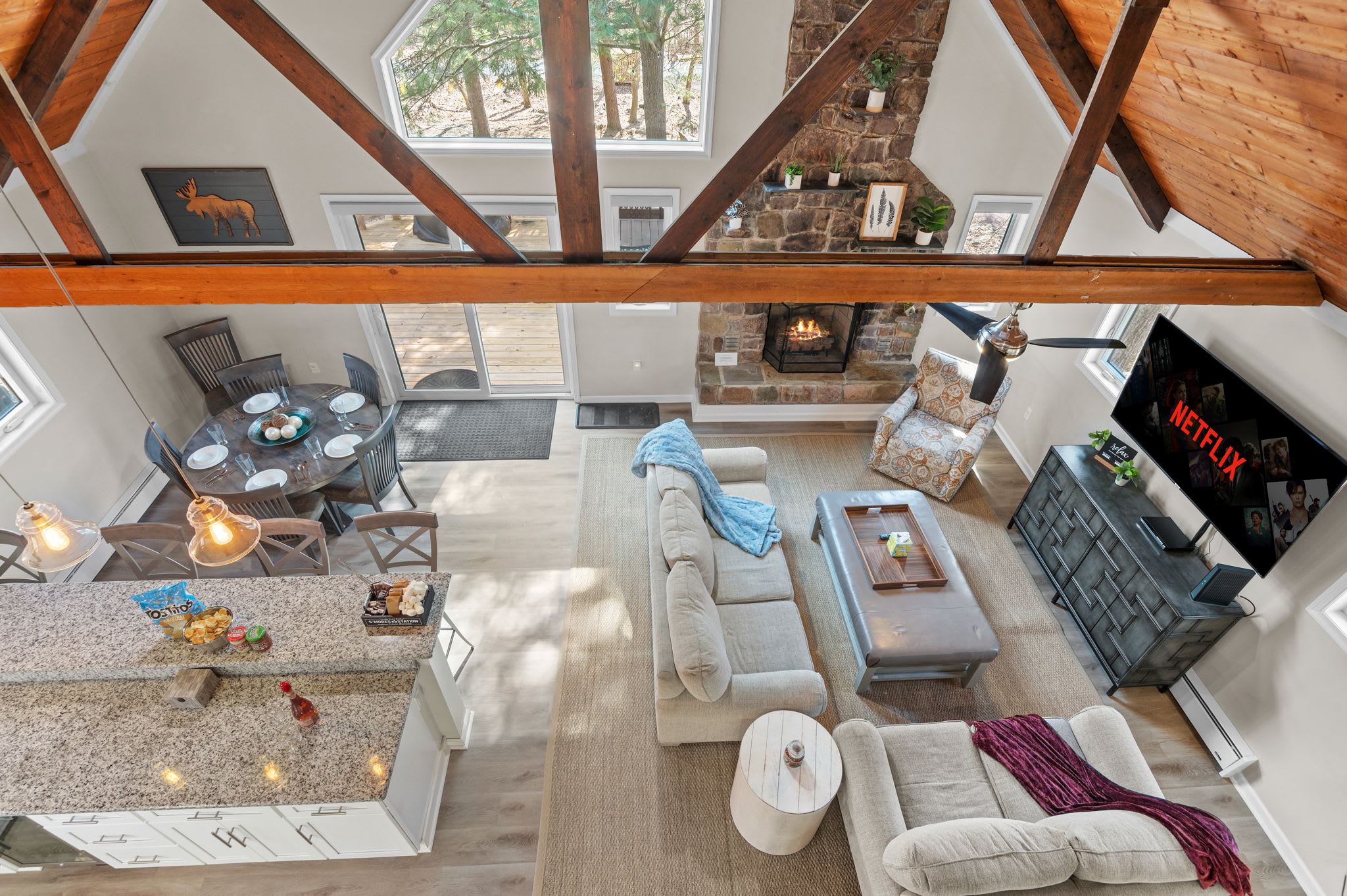 Lofted Views and Lounge Vibes
Get a full view of the beautiful open layout from above, where rustic wood meets comfy charm.