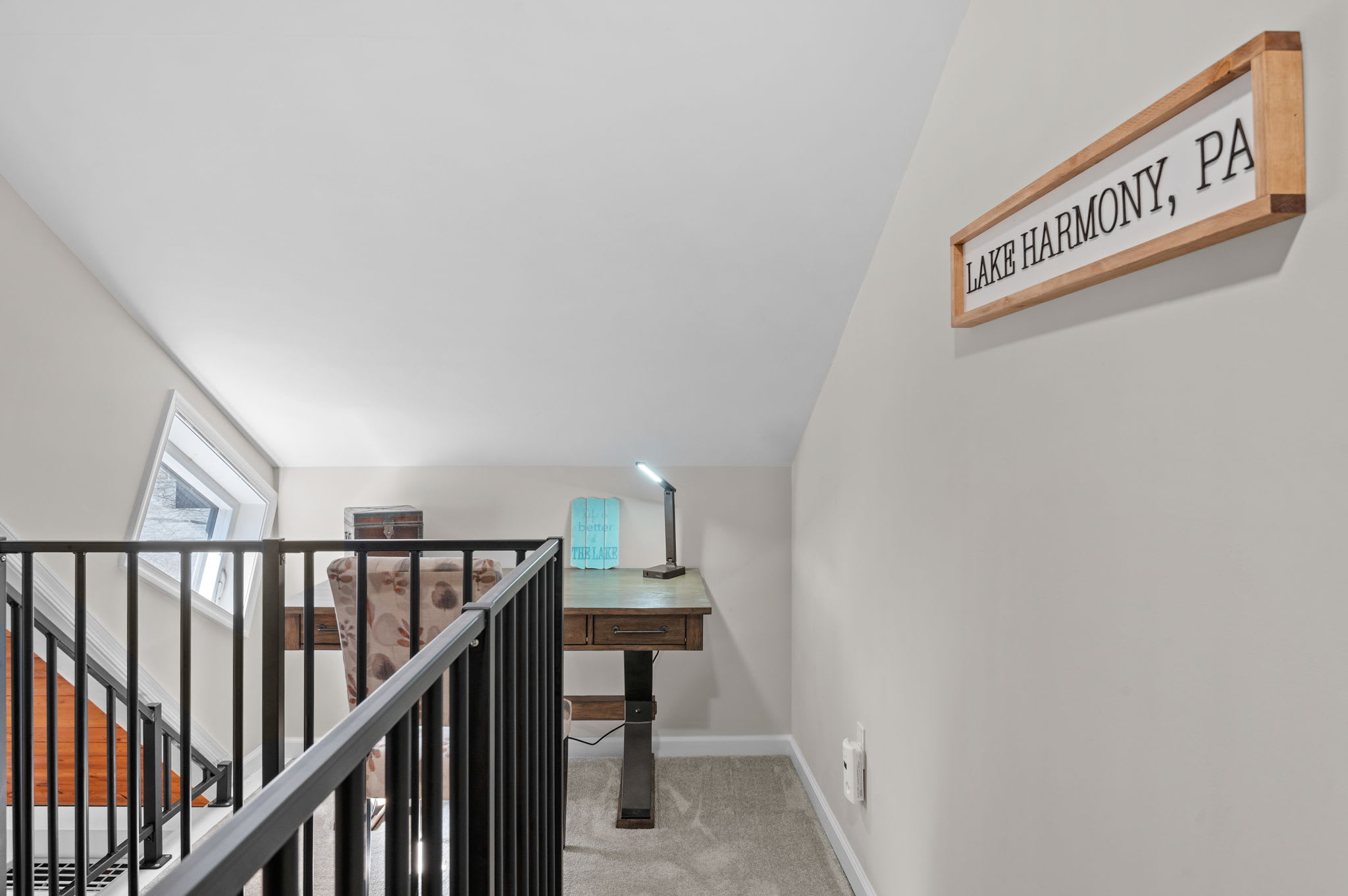 Lake Harmony Loft Vibe
A little desk nook at the top of the stairs, perfect for journaling, a quick email check, or daydreaming out the window.
