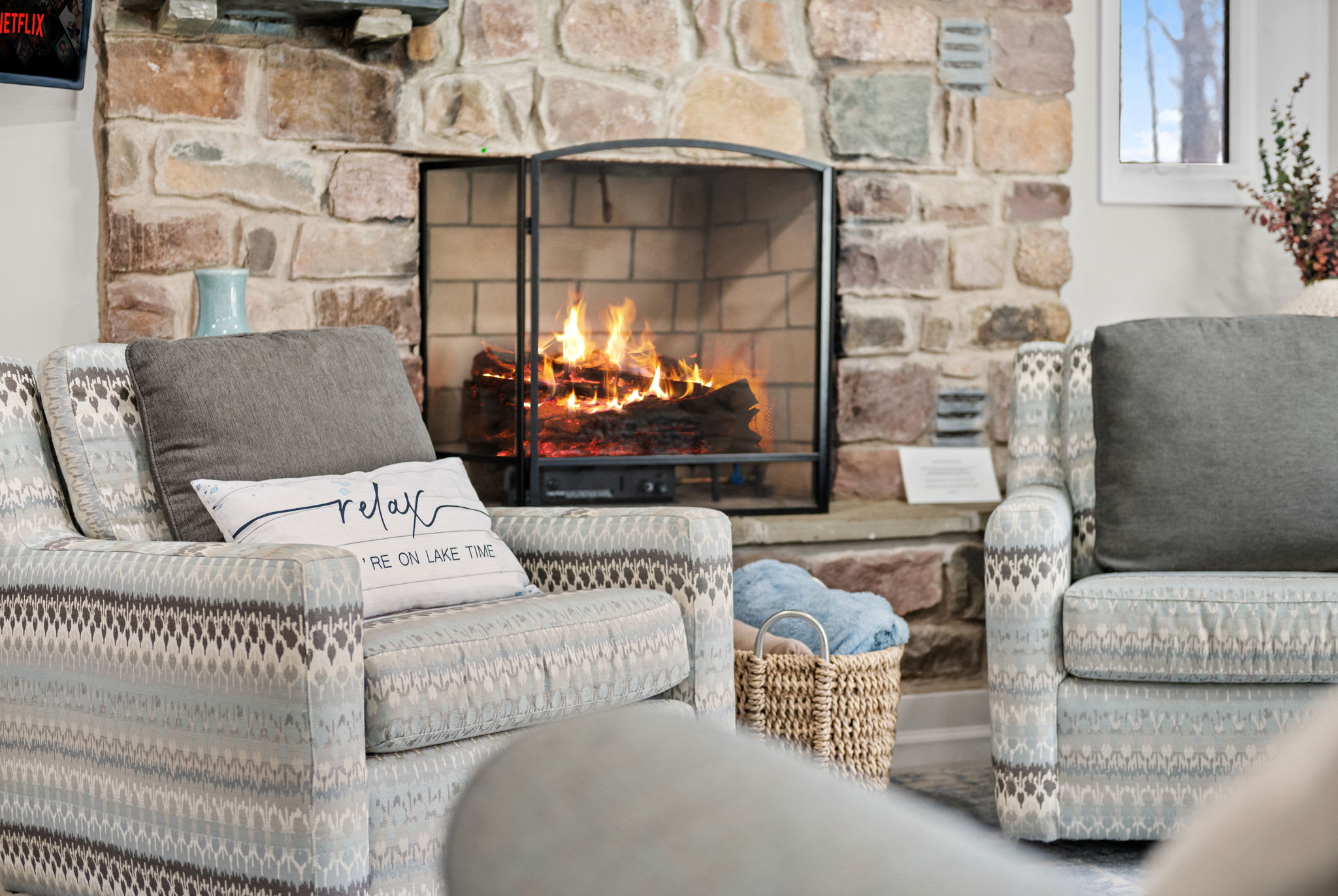 Comfy by the Fire
Nestle into these cozy chairs and let the flickering flames set the mood for a peaceful evening in.