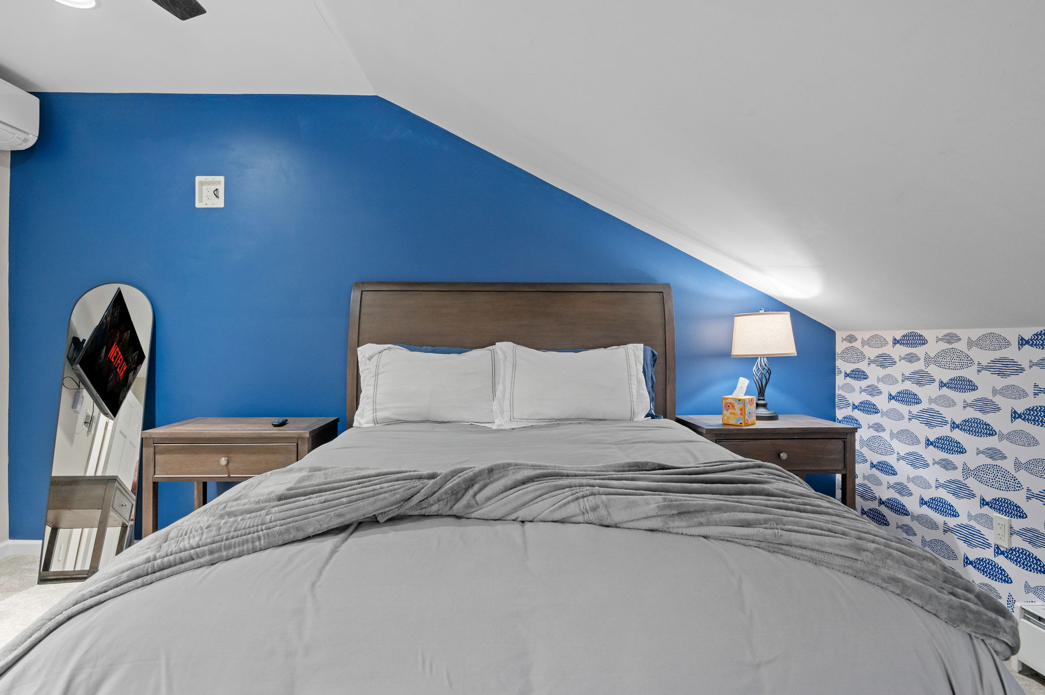 Cozy and Colorful
This blue-accented bedroom feels bright and fun while still offering all the comfort you need to unwind.