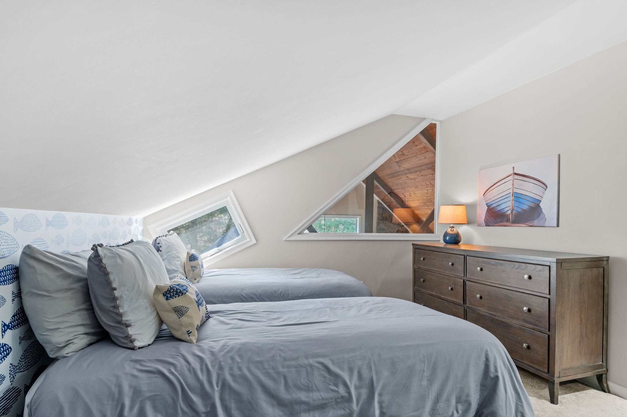 Quiet Loft Bedroom
A cozy retreat tucked under sloped ceilings, perfect for peaceful naps or a good night’s sleep.
