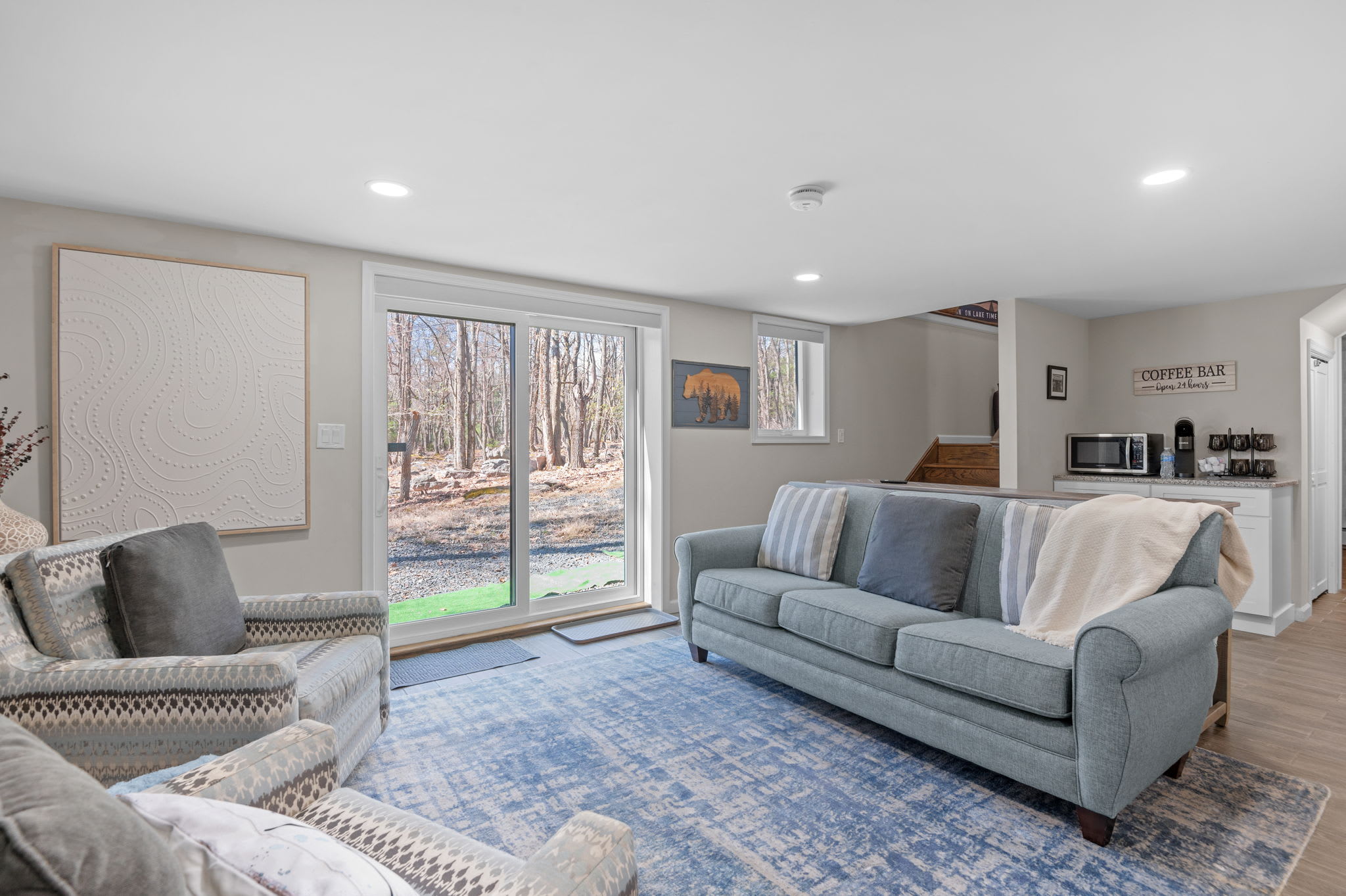 Lower-Level Lounge Space
Bright, open, and flexible, this chill zone offers comfy seating, big windows, and extra space to spread out.