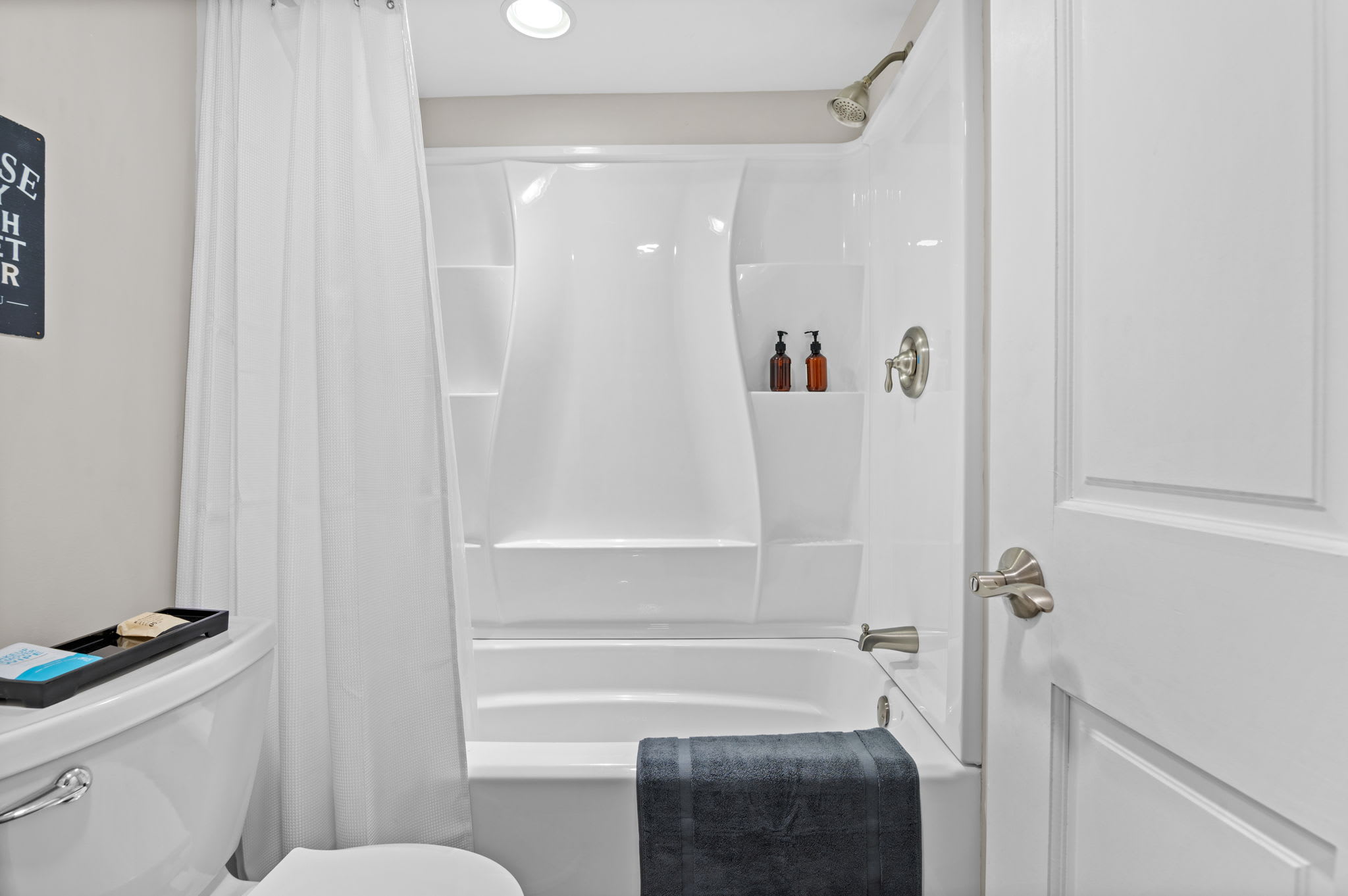 Simple and Sparkling Clean
This bathroom features sleek finishes and thoughtful details to keep things fresh and guest-ready.