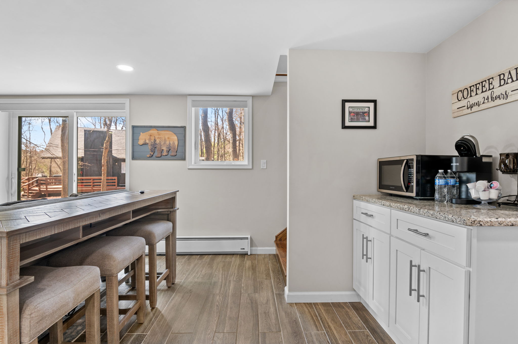 Dining Nook with a View
Enjoy meals or snacks with natural light pouring in, right next to the cozy kitchen space.