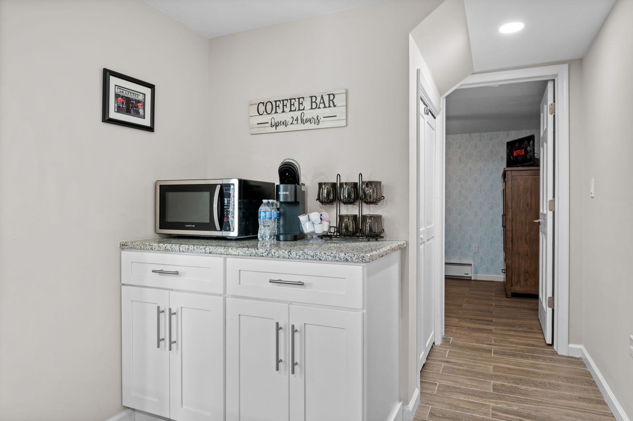 Coffee Bar Convenience
Fully stocked with all your morning must-haves, this nook includes a coffee maker, mugs, and quick breakfast options.