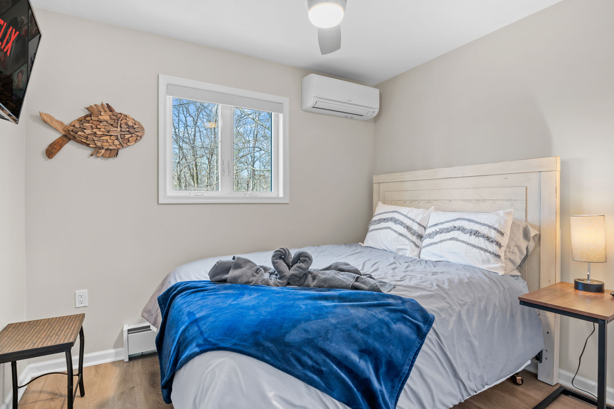 Fresh and Airy Bedroom
A mix of coastal decor and soft linens gives this space a breezy, inviting feel for a restful night.