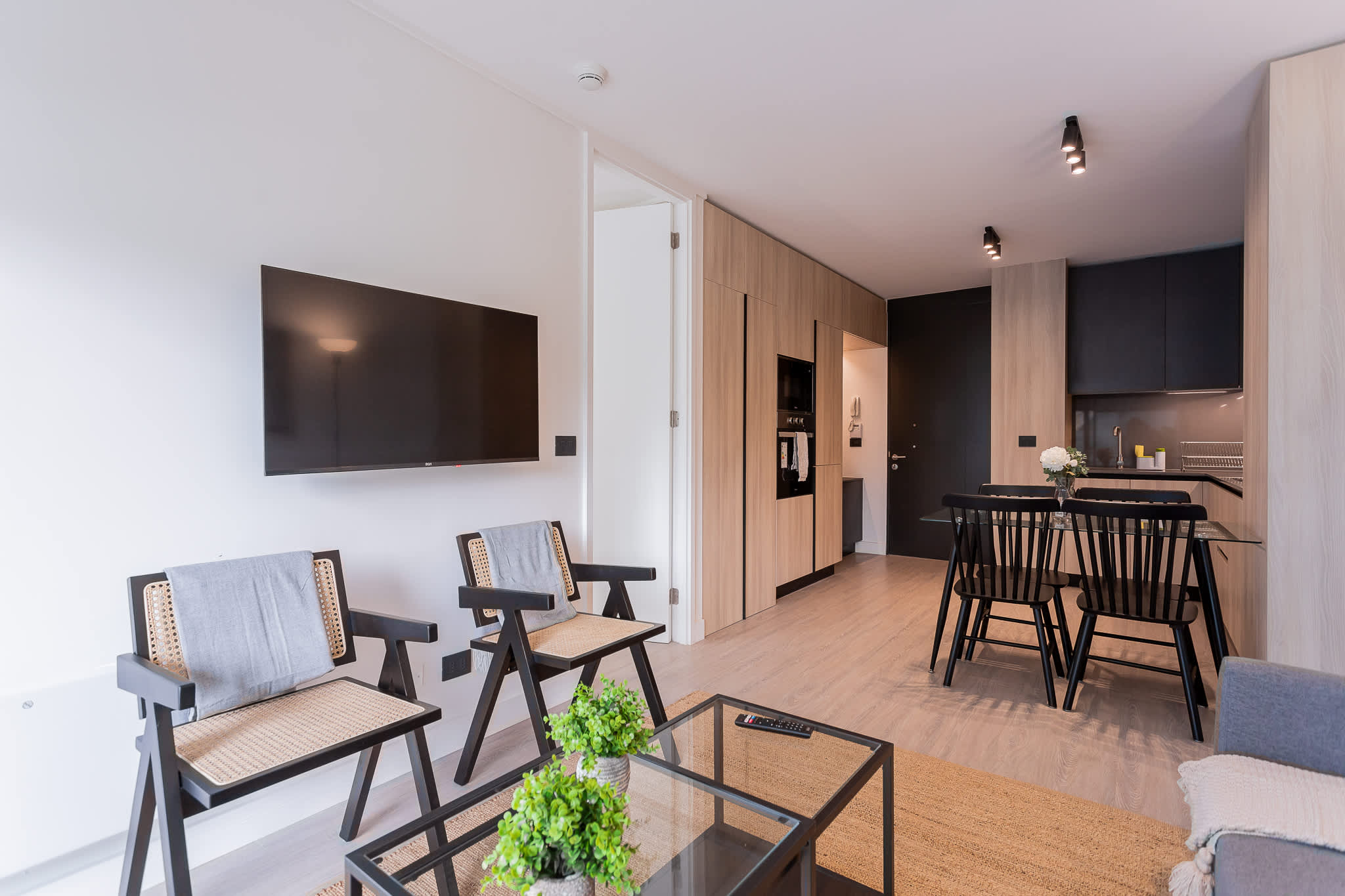 Experience modern comfort in this stylish living space, featuring sleek design and a cozy atmosphere for your perfect getaway.