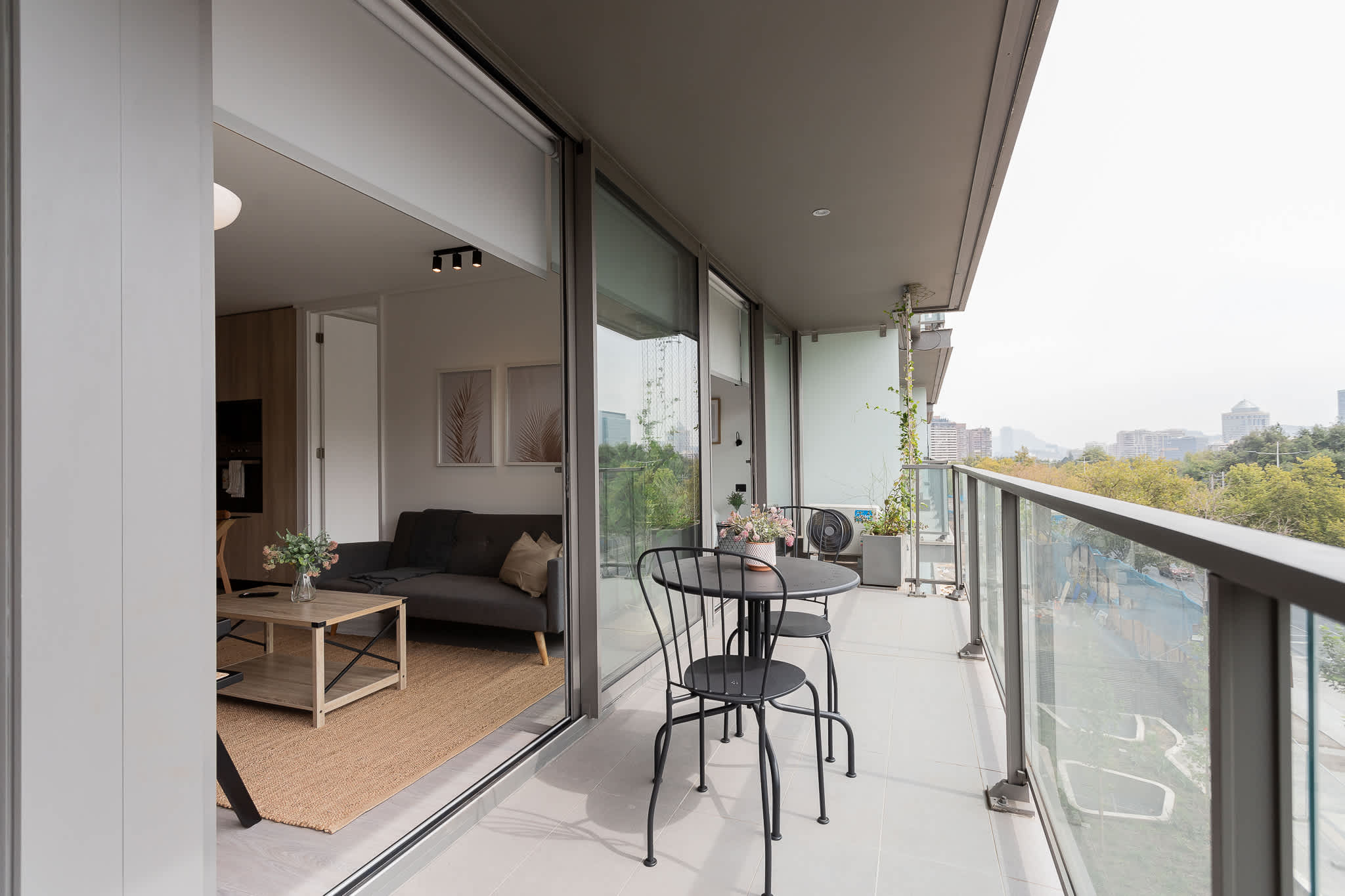 Enjoy a cozy retreat with a stunning city view from your private balcony, perfect for relaxation and unwinding after a day of exploration.