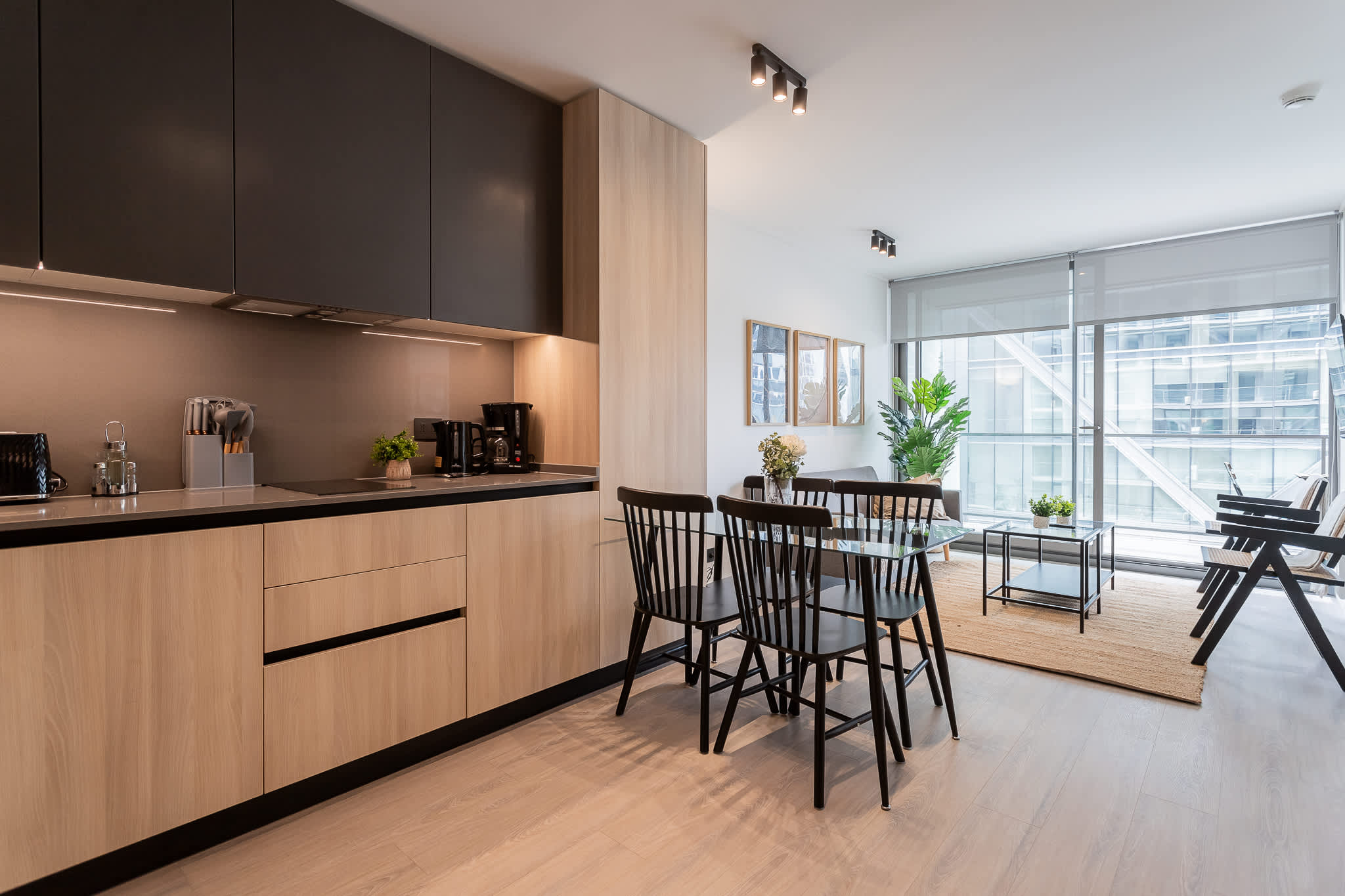 Experience modern living in this stylish kitchen with sleek cabinetry and abundant natural light, perfect for your culinary adventures.