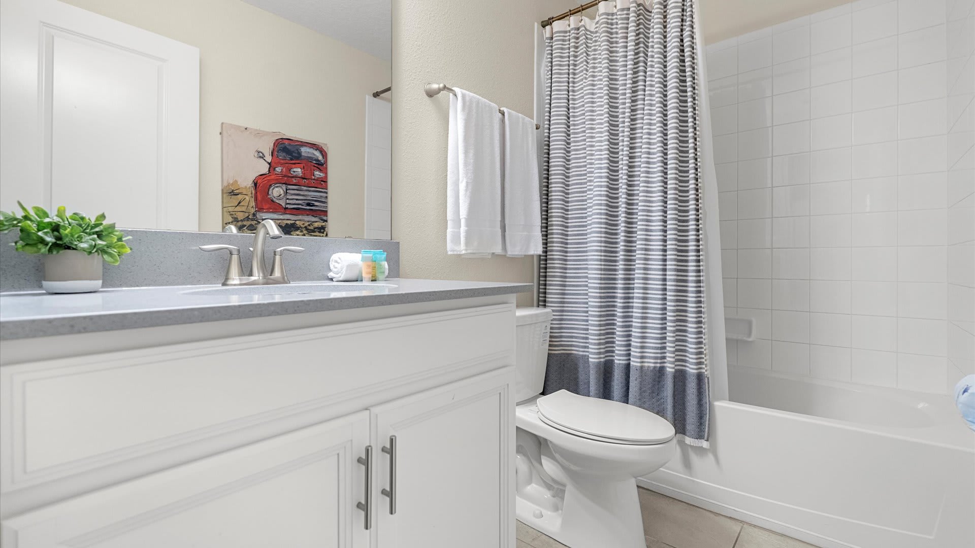 Full bathroom with integrated bathtub and shower
