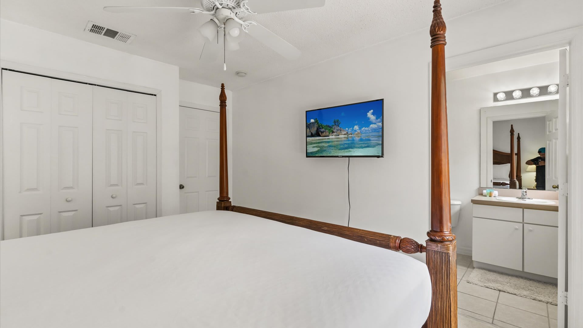 King bedroom with smart TV and en-suite bathroom