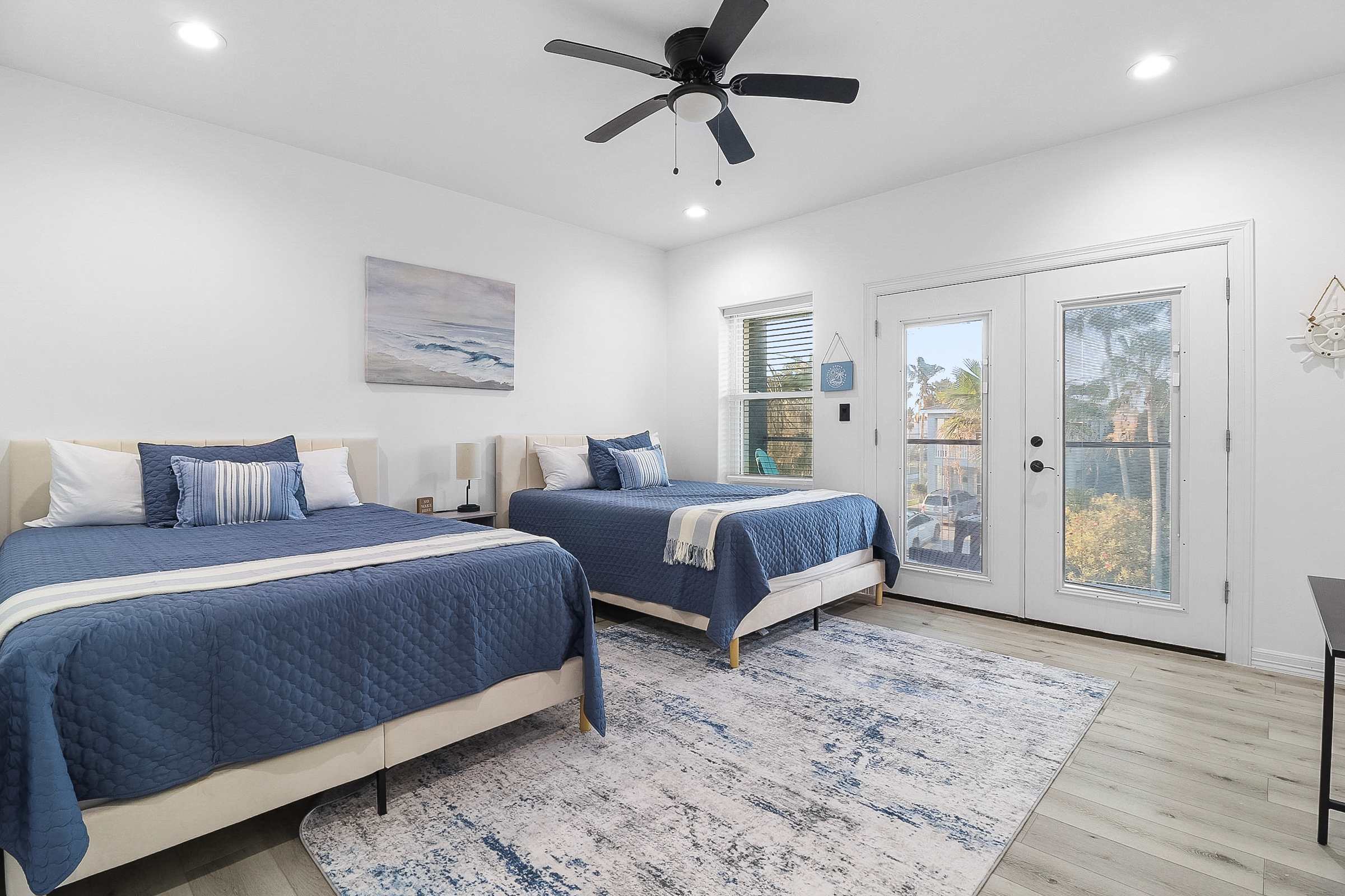 Double queen bedroom with shared bathroom