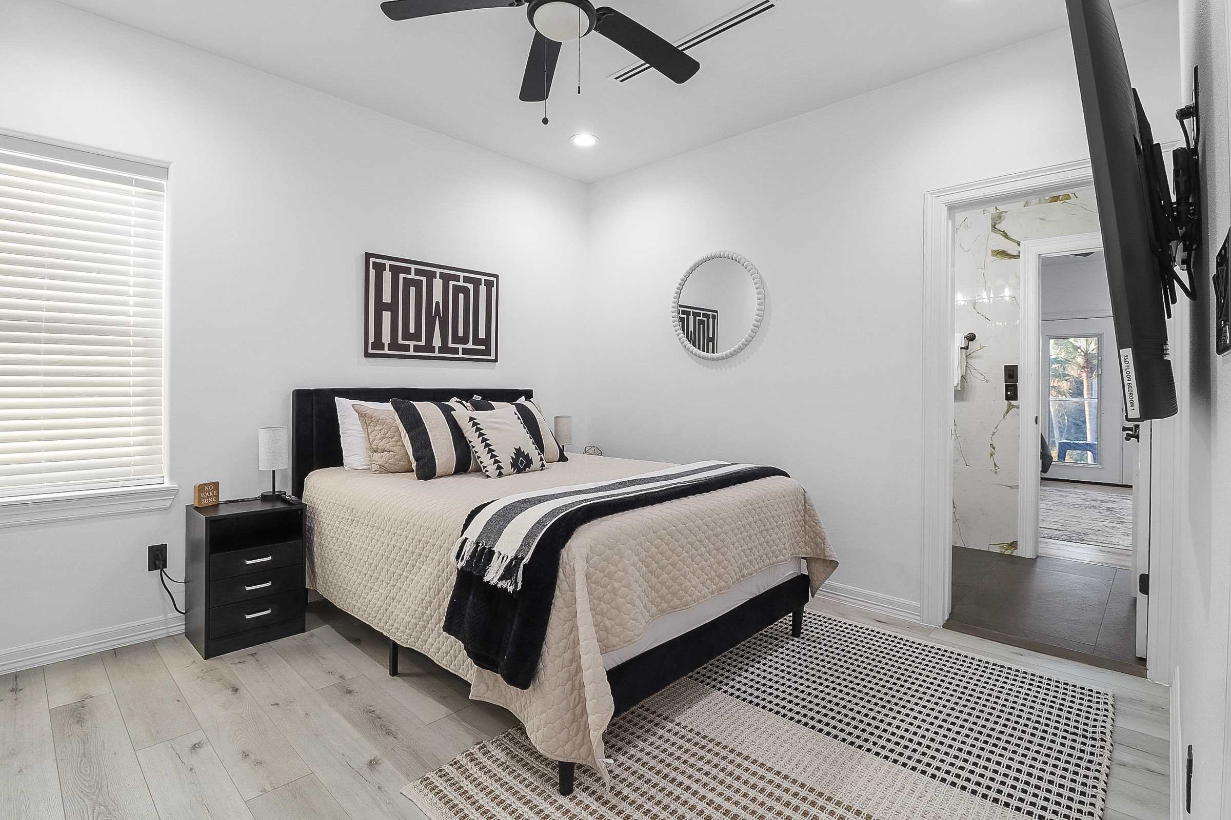 Queen bedroom with shared bathroom