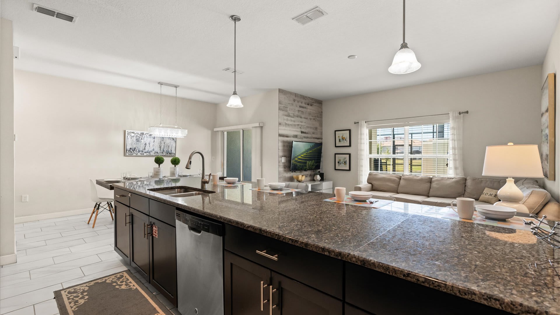 Fully Equipped Chef's Kitchen with Silver Appliances 