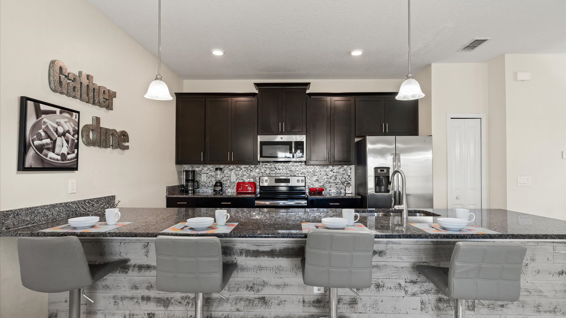 Fully Equipped Chef's Kitchen with Bar Stool Seating