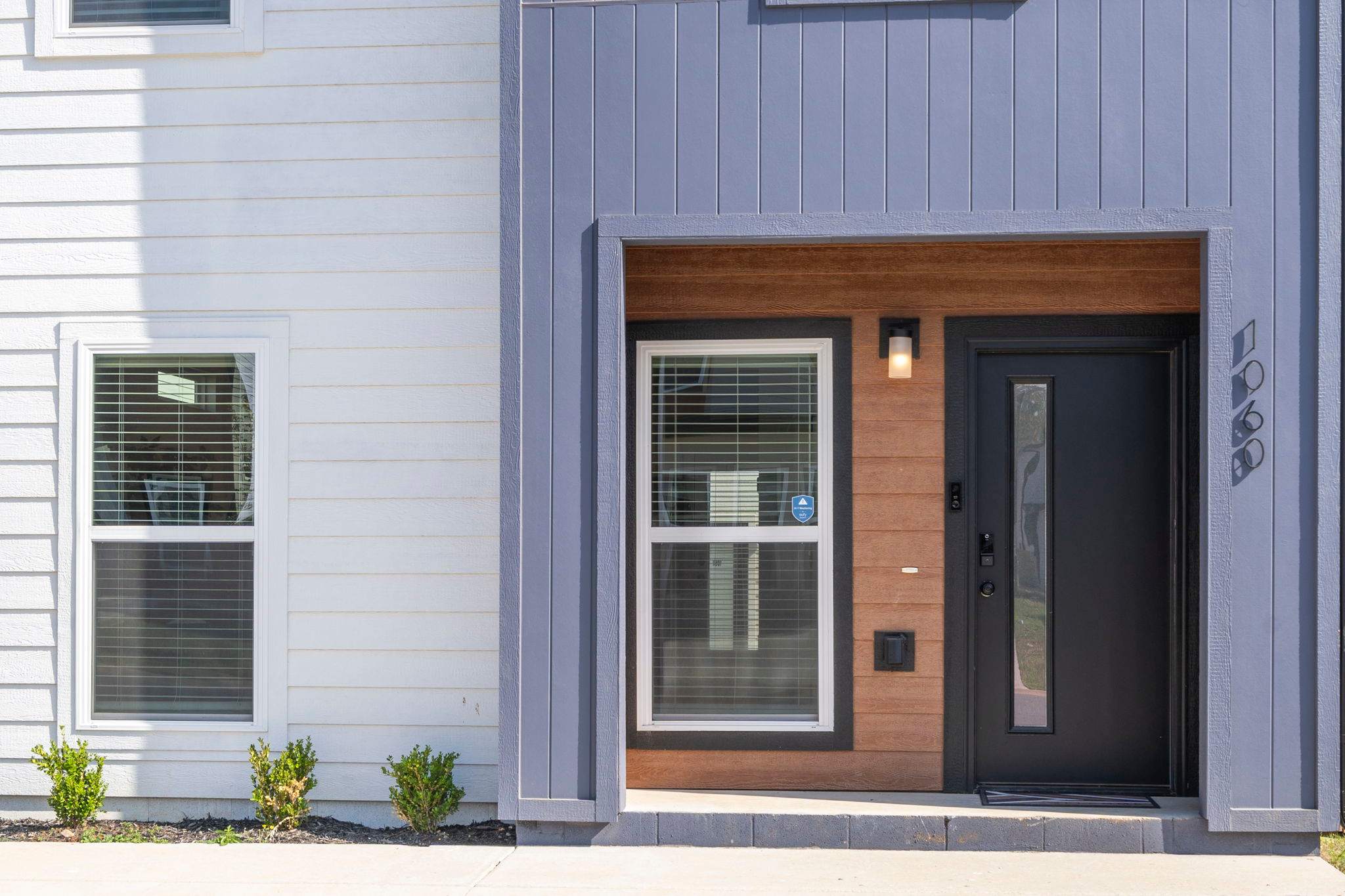 Enter using unique door code on the front.