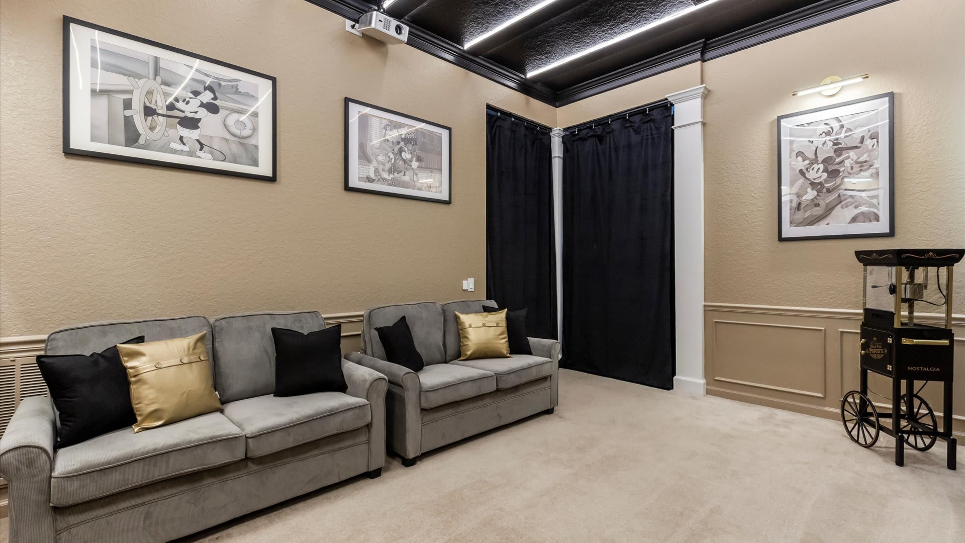 Mickey-Mouse Themed In-Home Cinema with Pop-corn machine