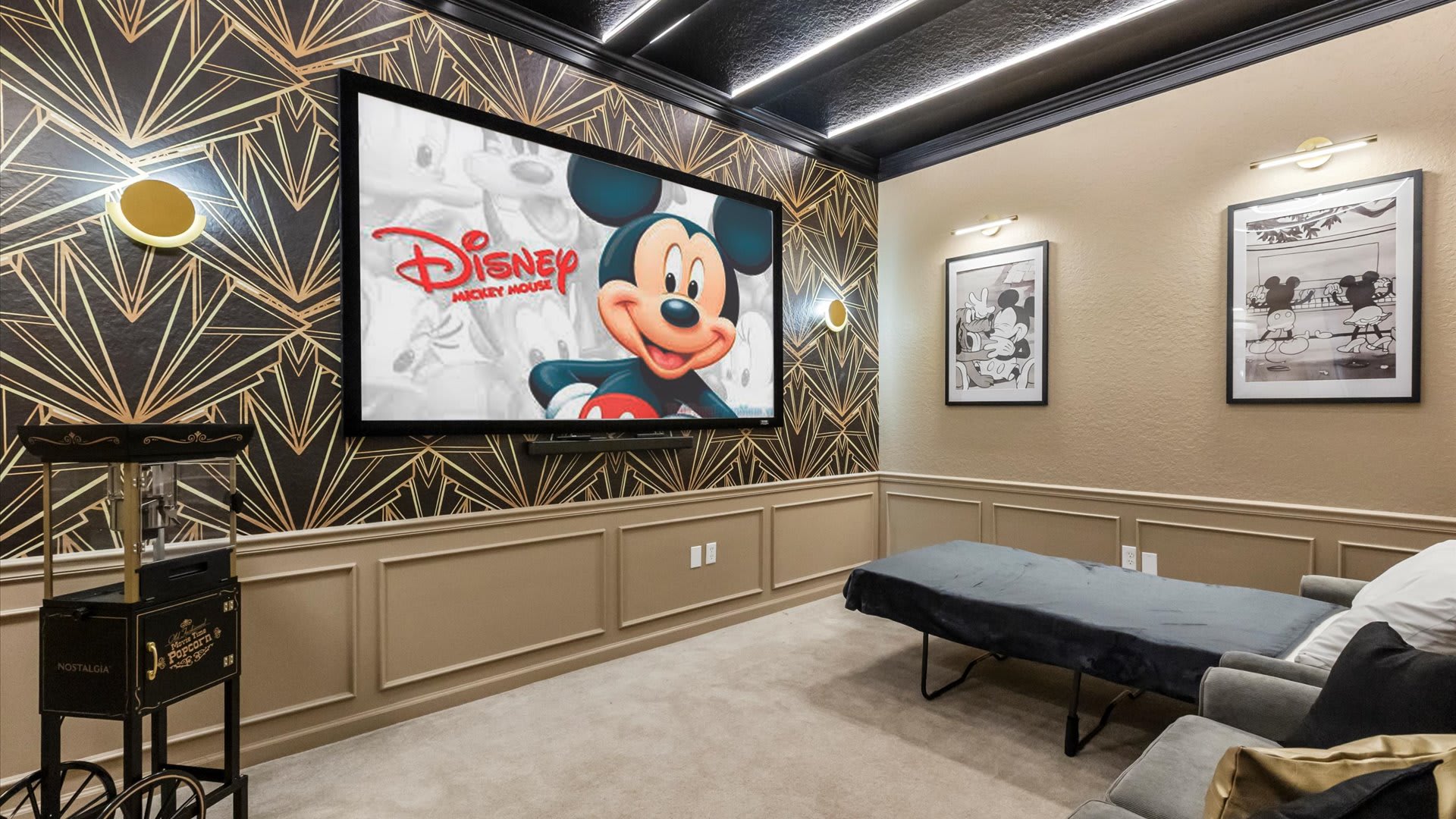 Mickey-Mouse Themed In-Home Cinema with Pop-corn machine