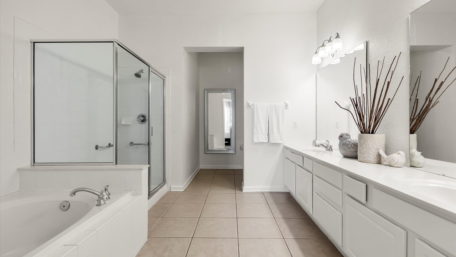 Ensuite Bathroom featuring walk-in shower and bathtub