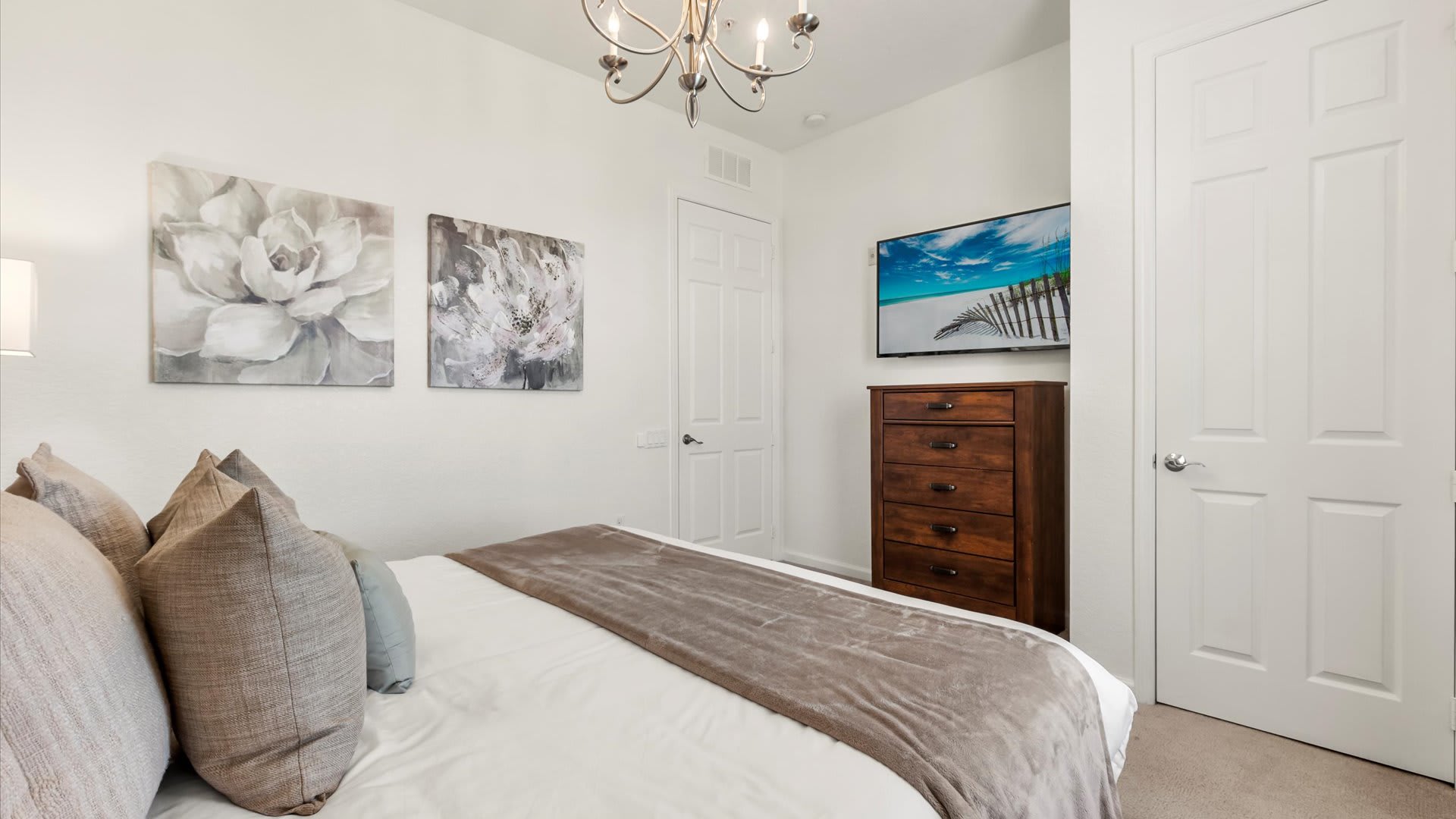 Tasteful King Bedroom with Smart TV