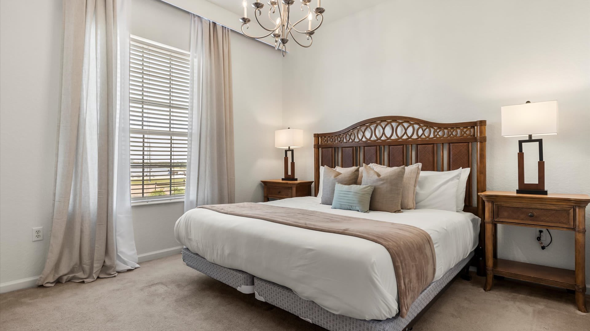 Tasteful King Bedroom with Bright Natural lighting 