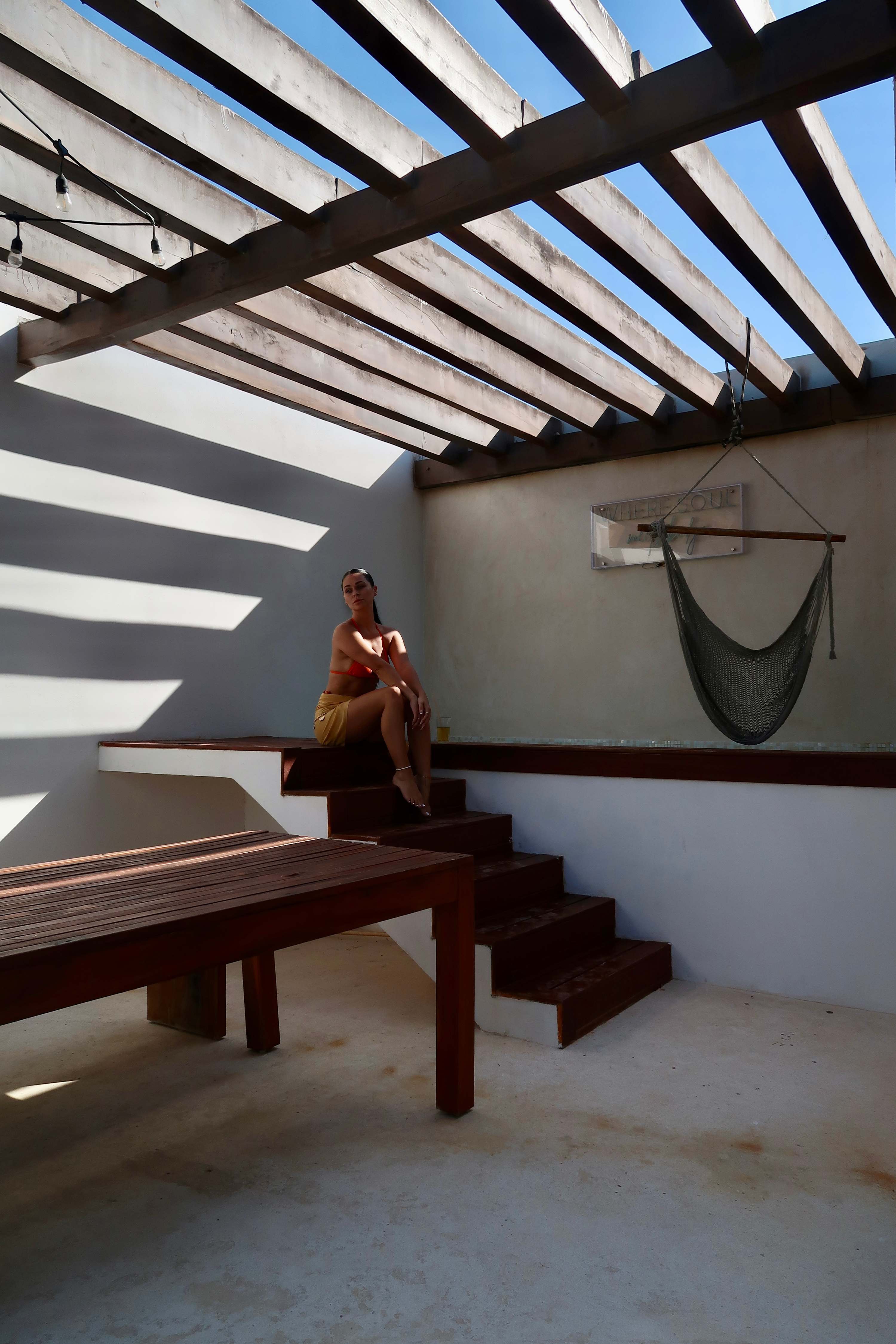 Terrace with a plunge pool and outdoor dining area.