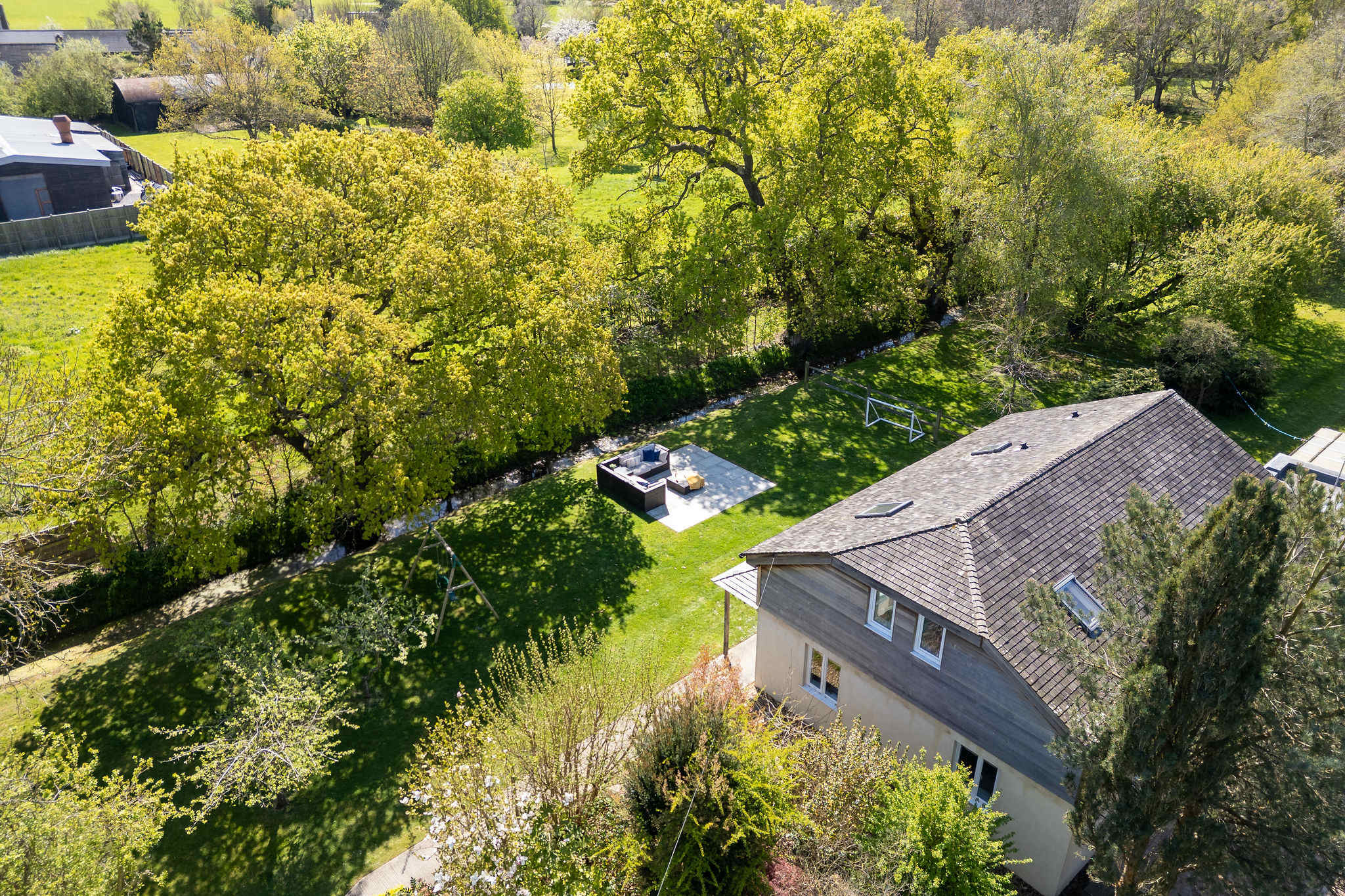 The home is rural and secluded, with plenty of parking and large garden.