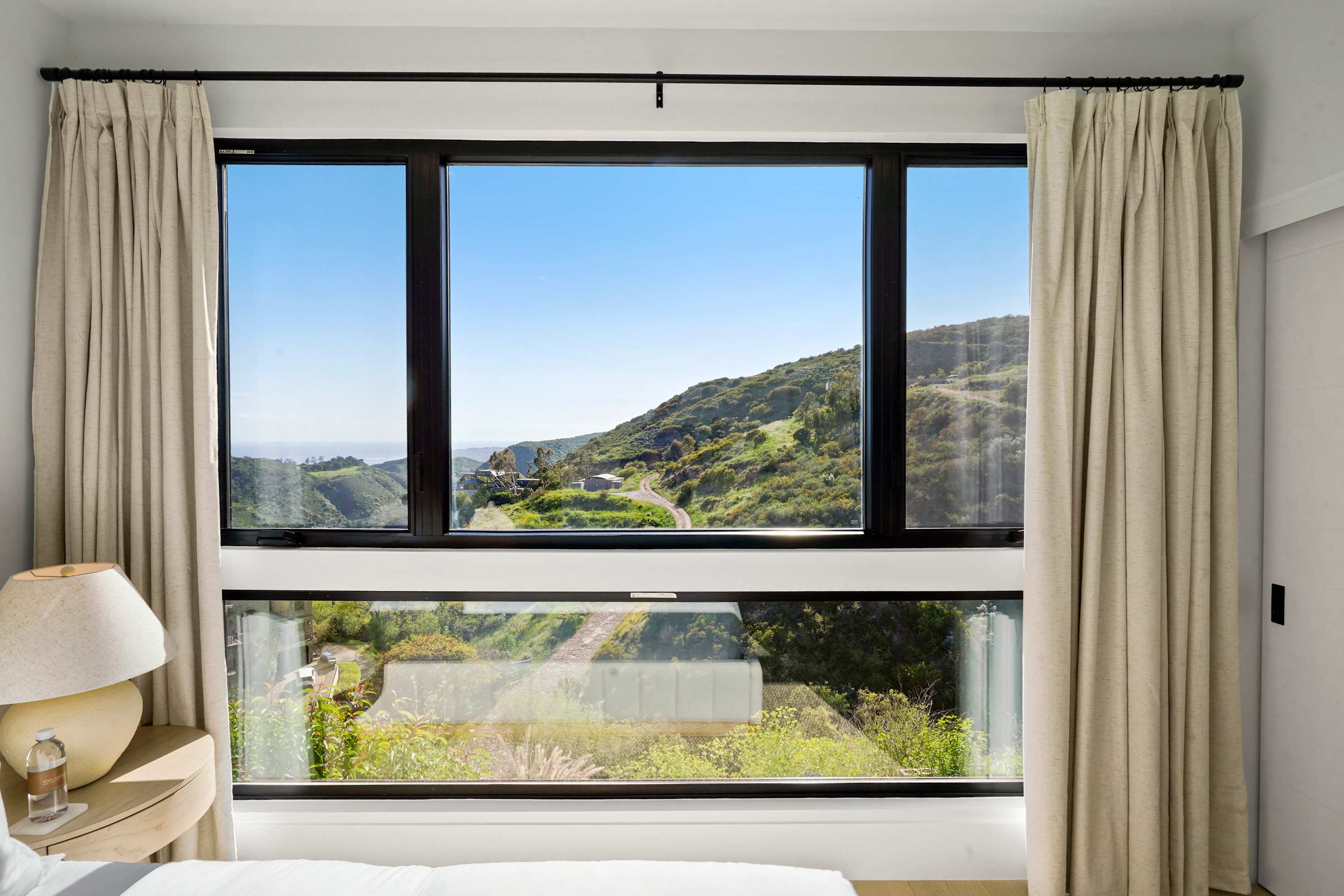 Ocean glimpses and rolling hillside views greet you from every bedroom.