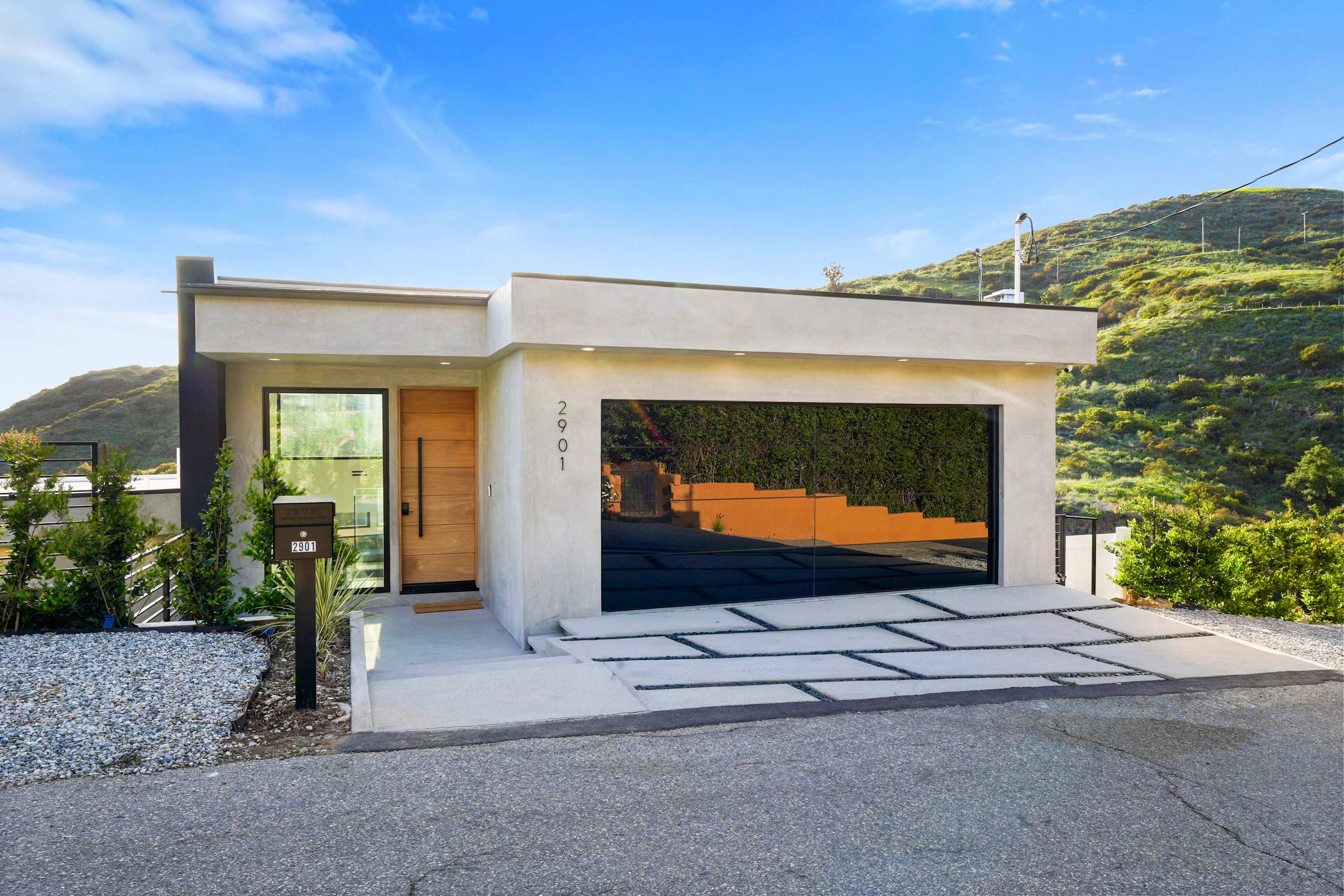 Private two-car garage with direct access to the home.