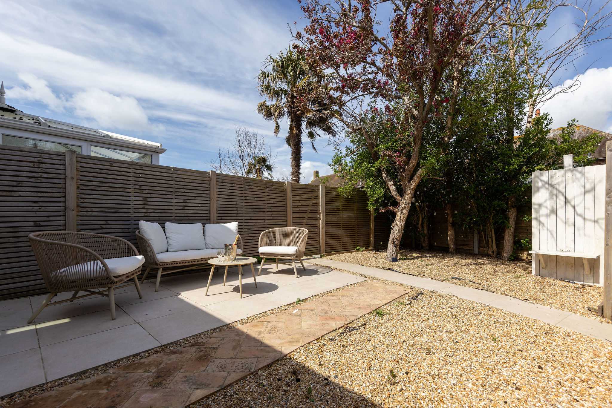 Outdoor area with patio and seating.