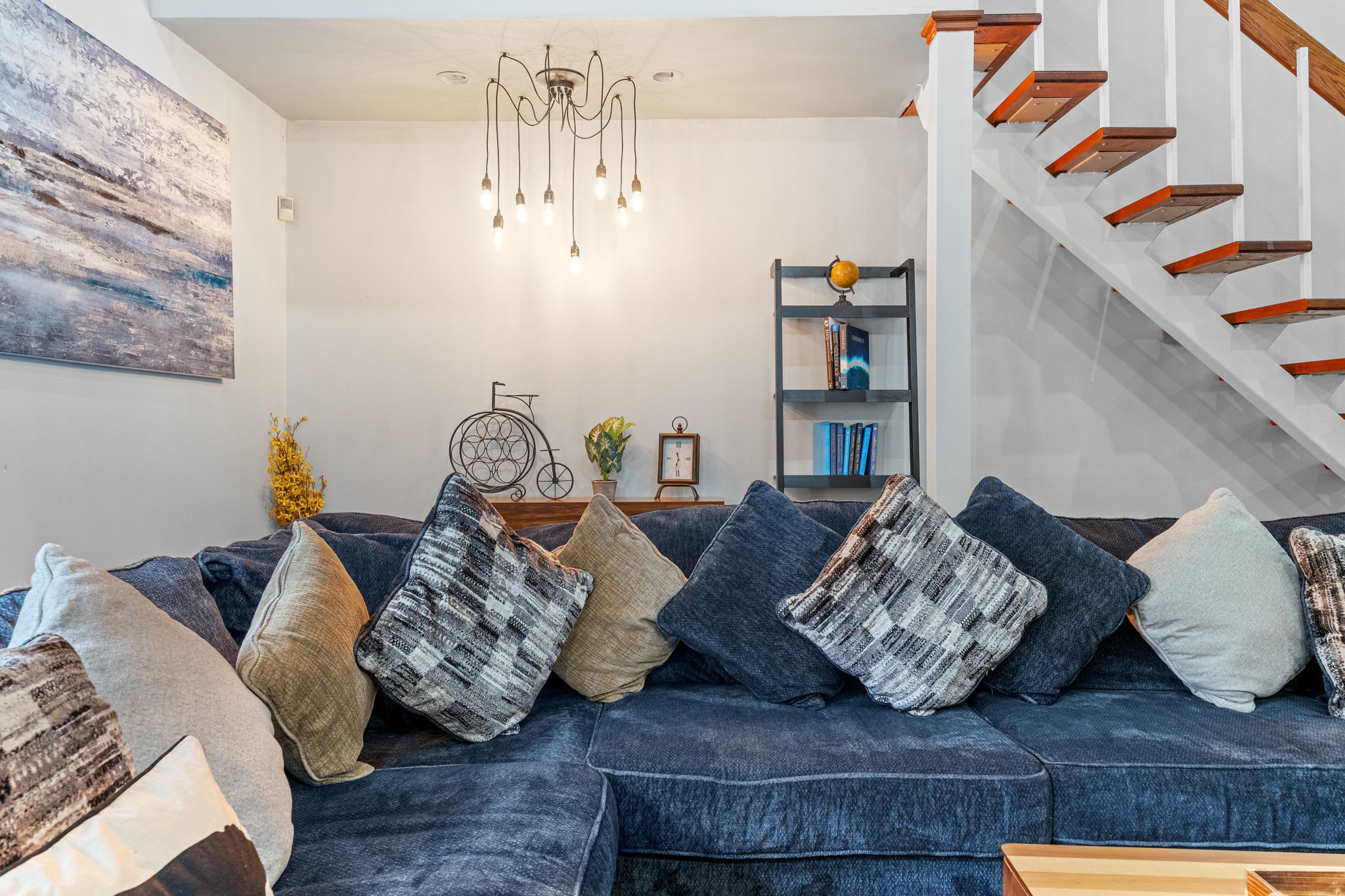 Homey Touches Everywhere
Every corner feels warm and welcoming with soft lighting, cozy throws, and charming design details.