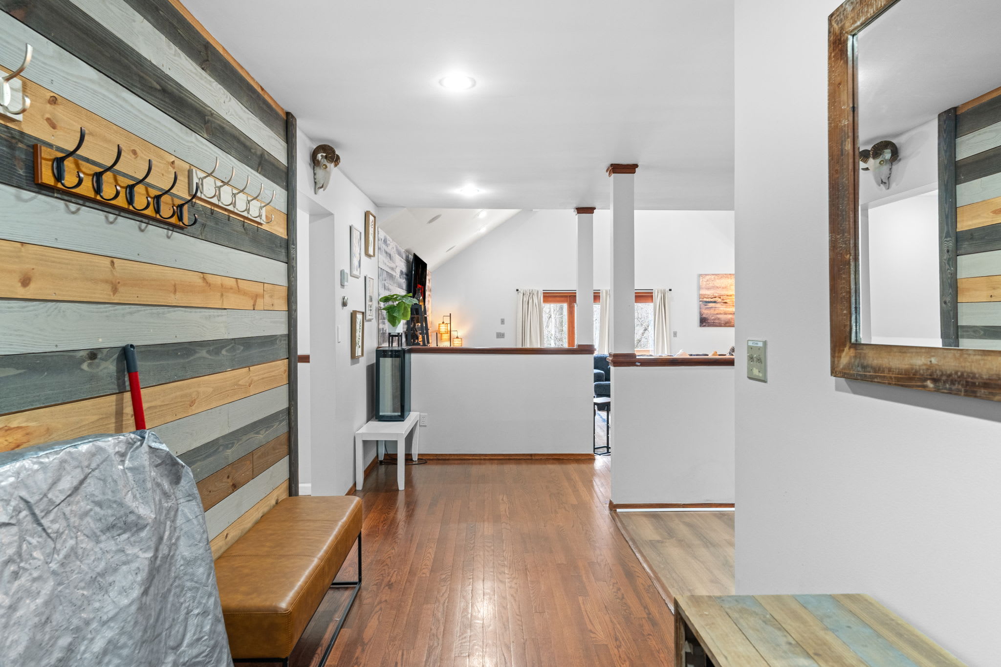 Welcome with Style
A rustic entryway with hooks and a bench gives you a functional and stylish spot to drop your bags and settle in.